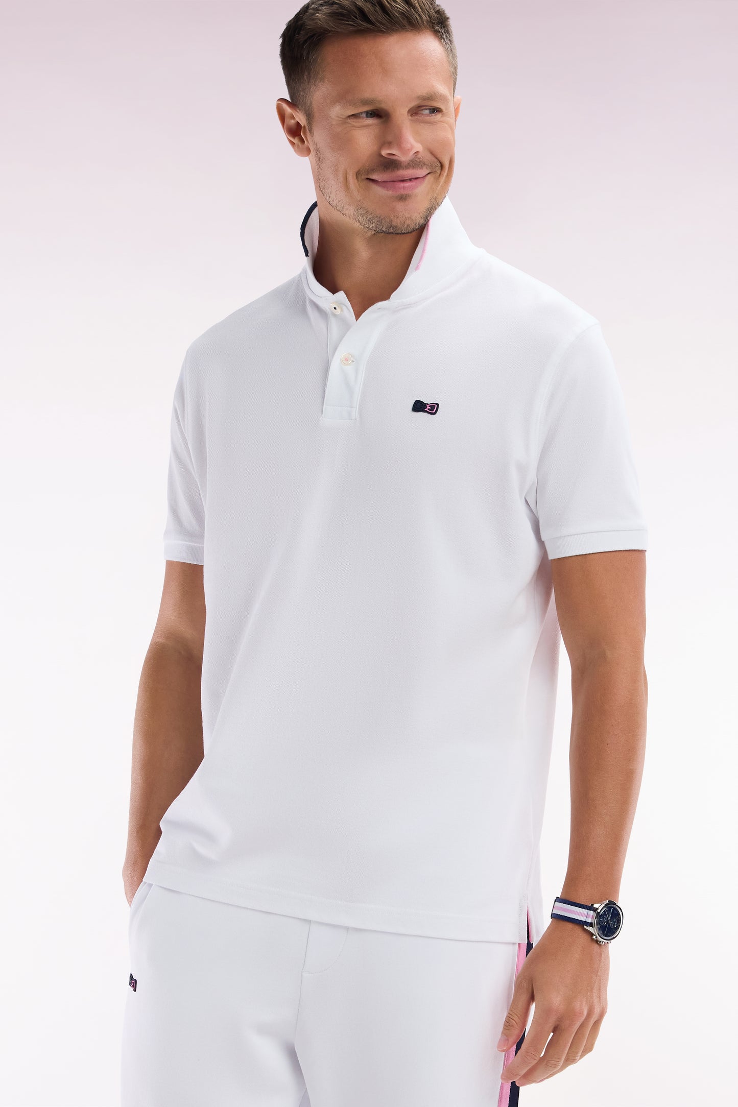 Relaxed-fit short-sleeved polo shirt in white cotton with piped collar
