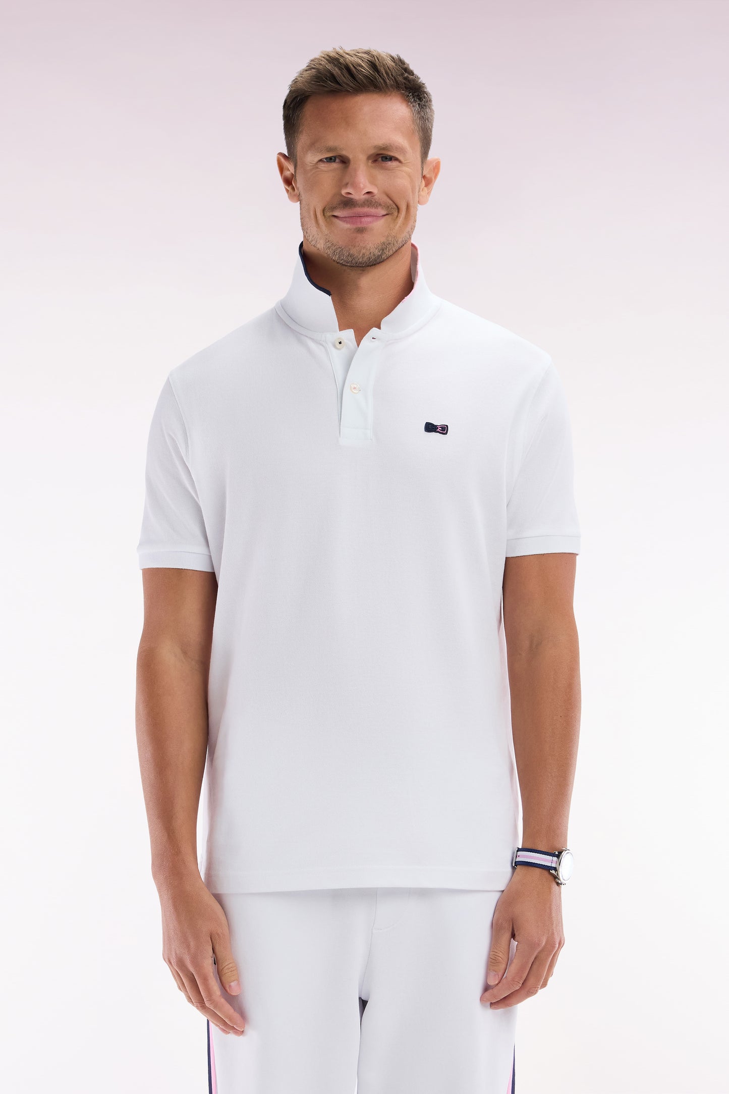 Relaxed-fit short-sleeved polo shirt in white cotton with piped collar