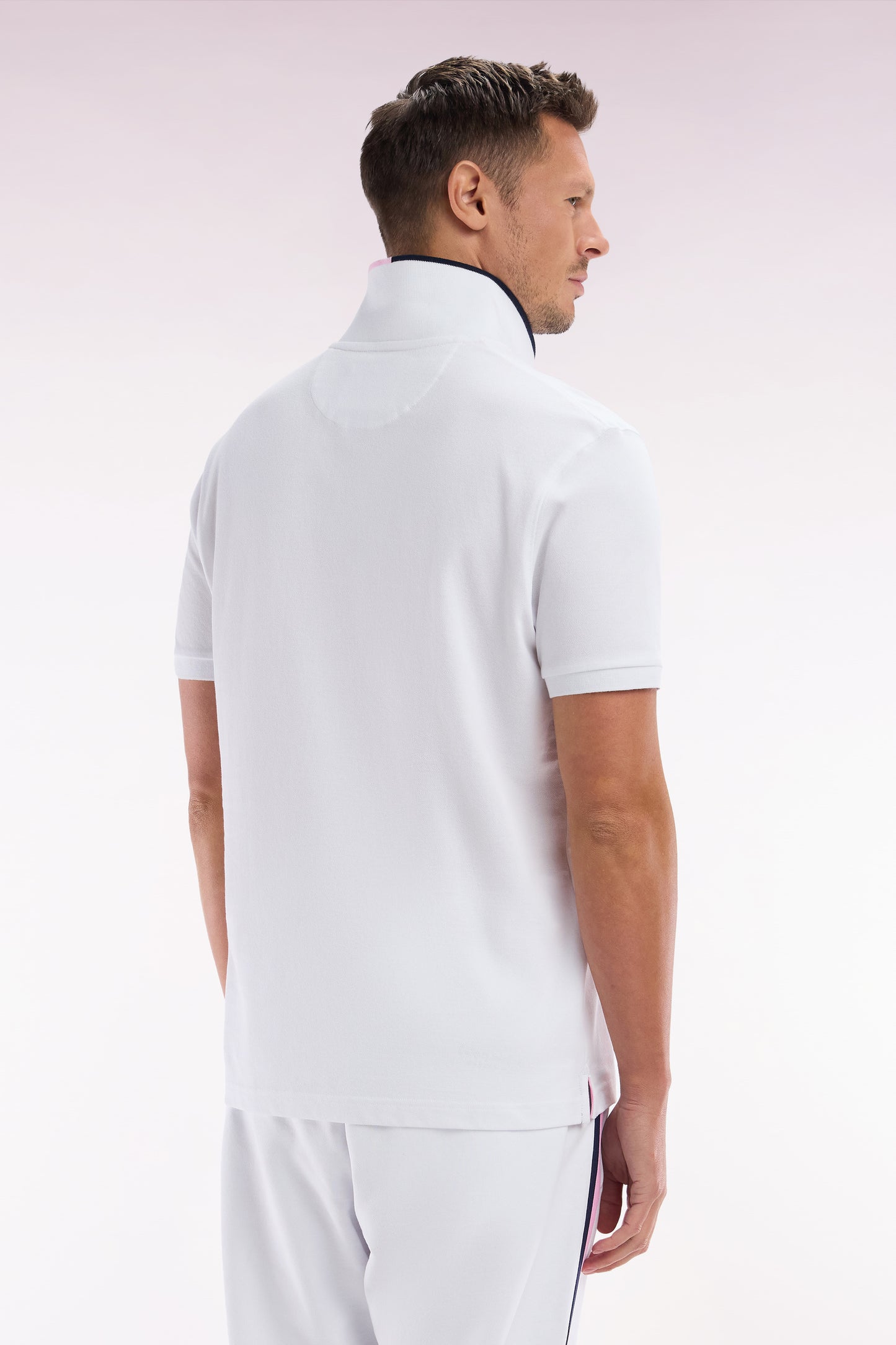 Relaxed-fit short-sleeved polo shirt in white cotton with piped collar