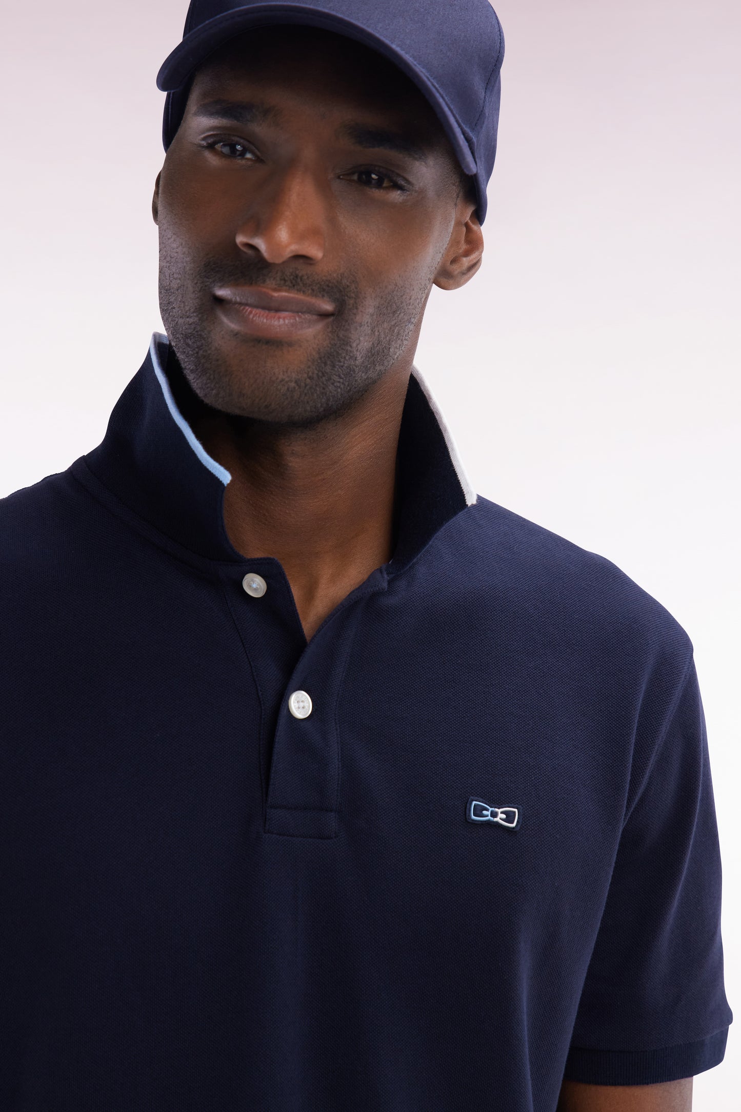 Relaxed-fit short-sleeved polo shirt in navy cotton with piped collar