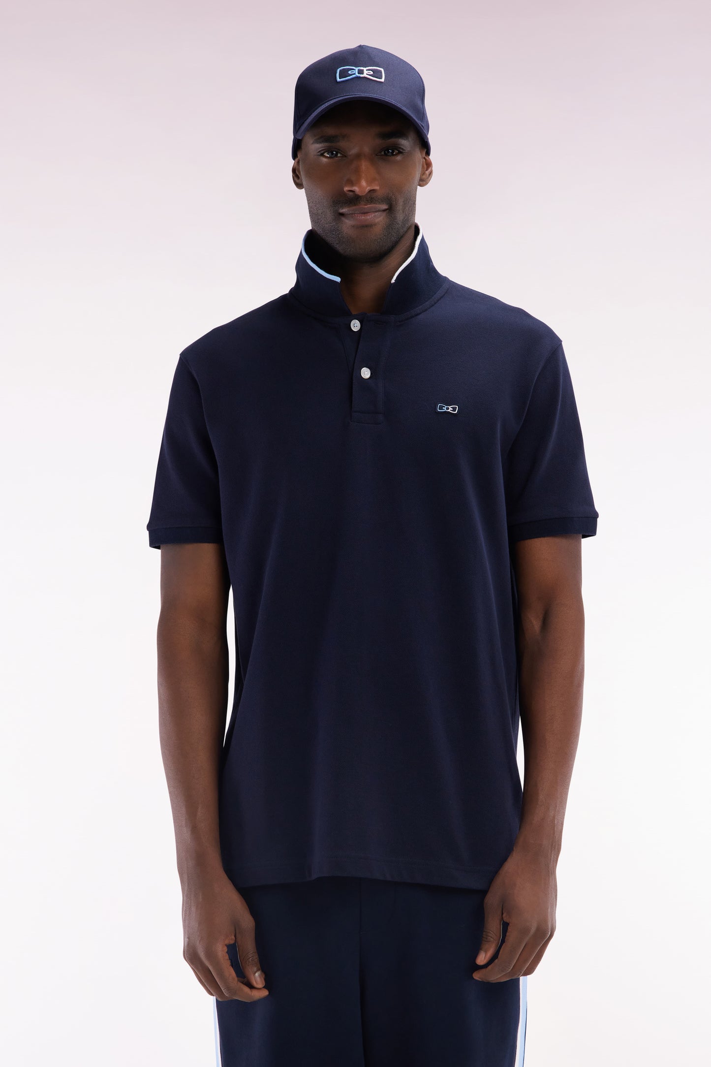 Relaxed-fit short-sleeved polo shirt in navy cotton with piped collar