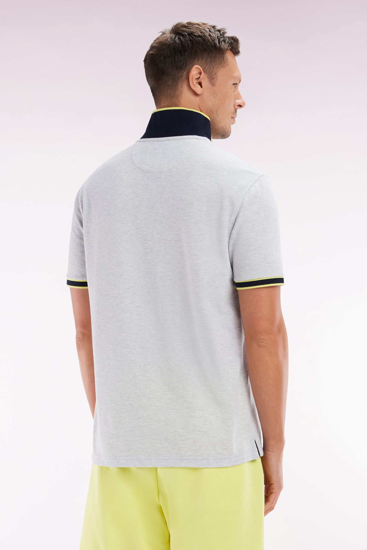 Relaxed-fit short-sleeved polo shirt in yellow cotton with colorful stripes