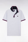 Relaxed-fit short-sleeved polo shirt in pink cotton with colorful stripes