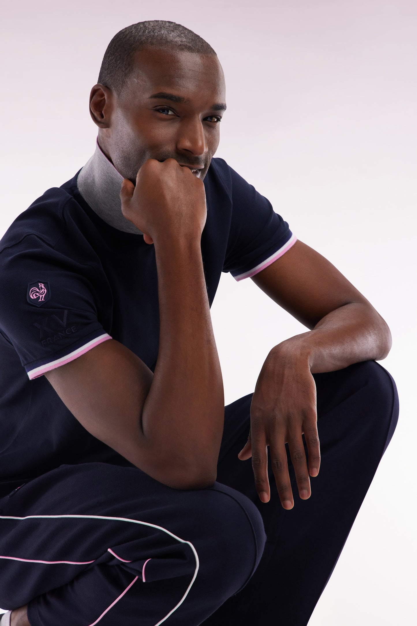 Slim-fit short-sleeved polo shirt in navy stretch cotton with zipped collar