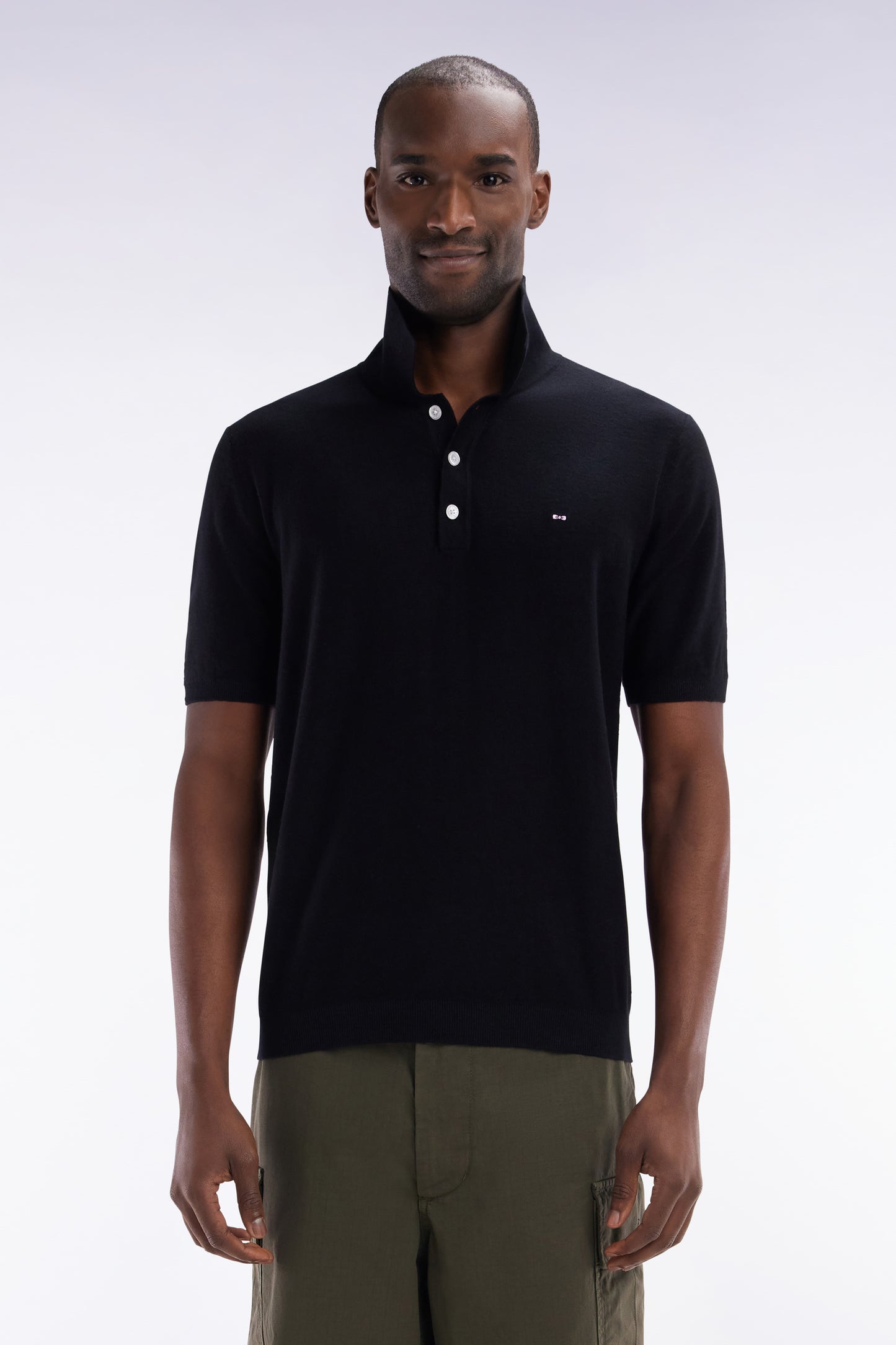 Straight-fit sleeveless black polo collar jumper