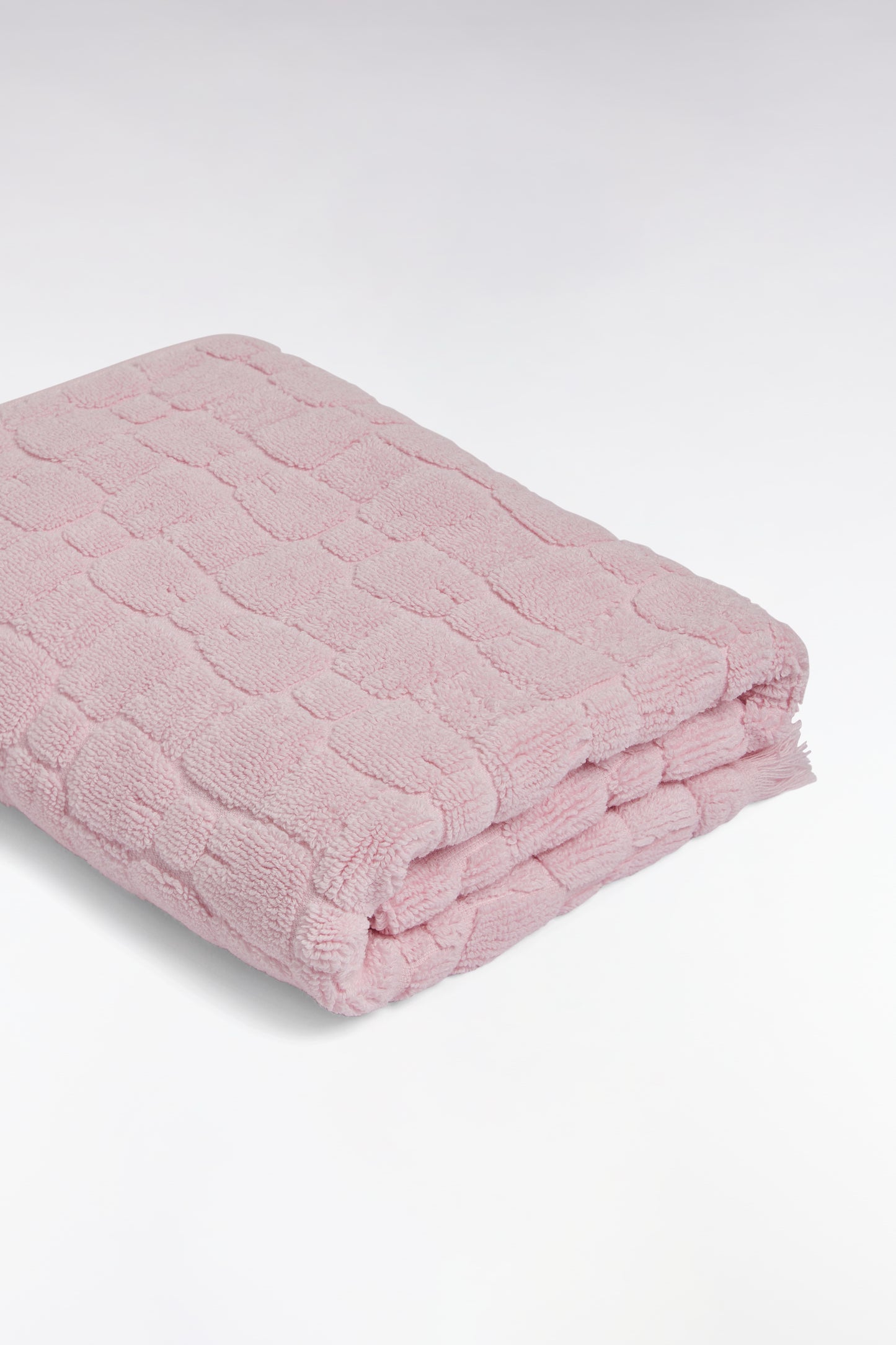 Pink cotton hand towel with micro bowknot patterns