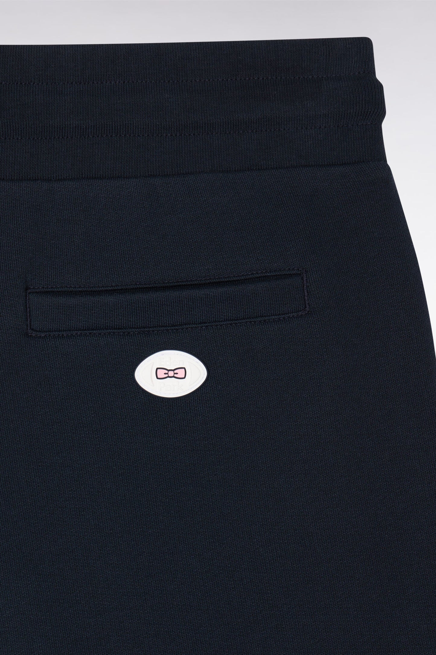 Navy fleece shorts with striped leg trims