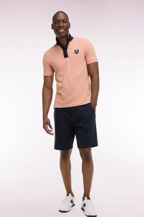 Navy cotton fleece shorts with embroidered badge - Image 1