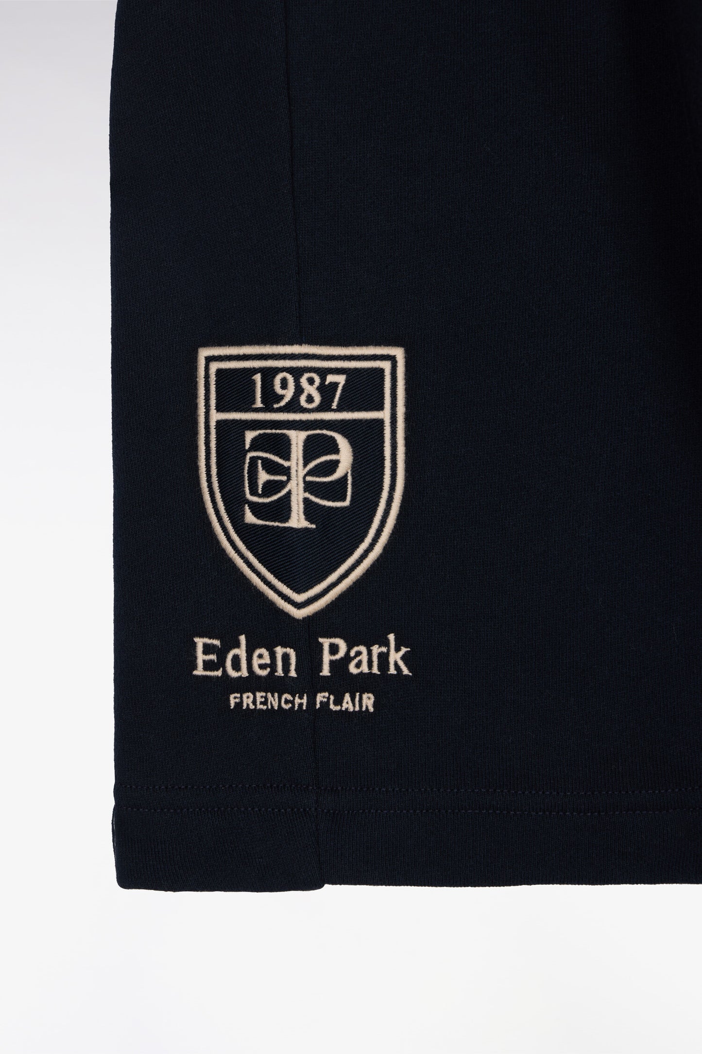 Navy cotton fleece shorts with embroidered badge