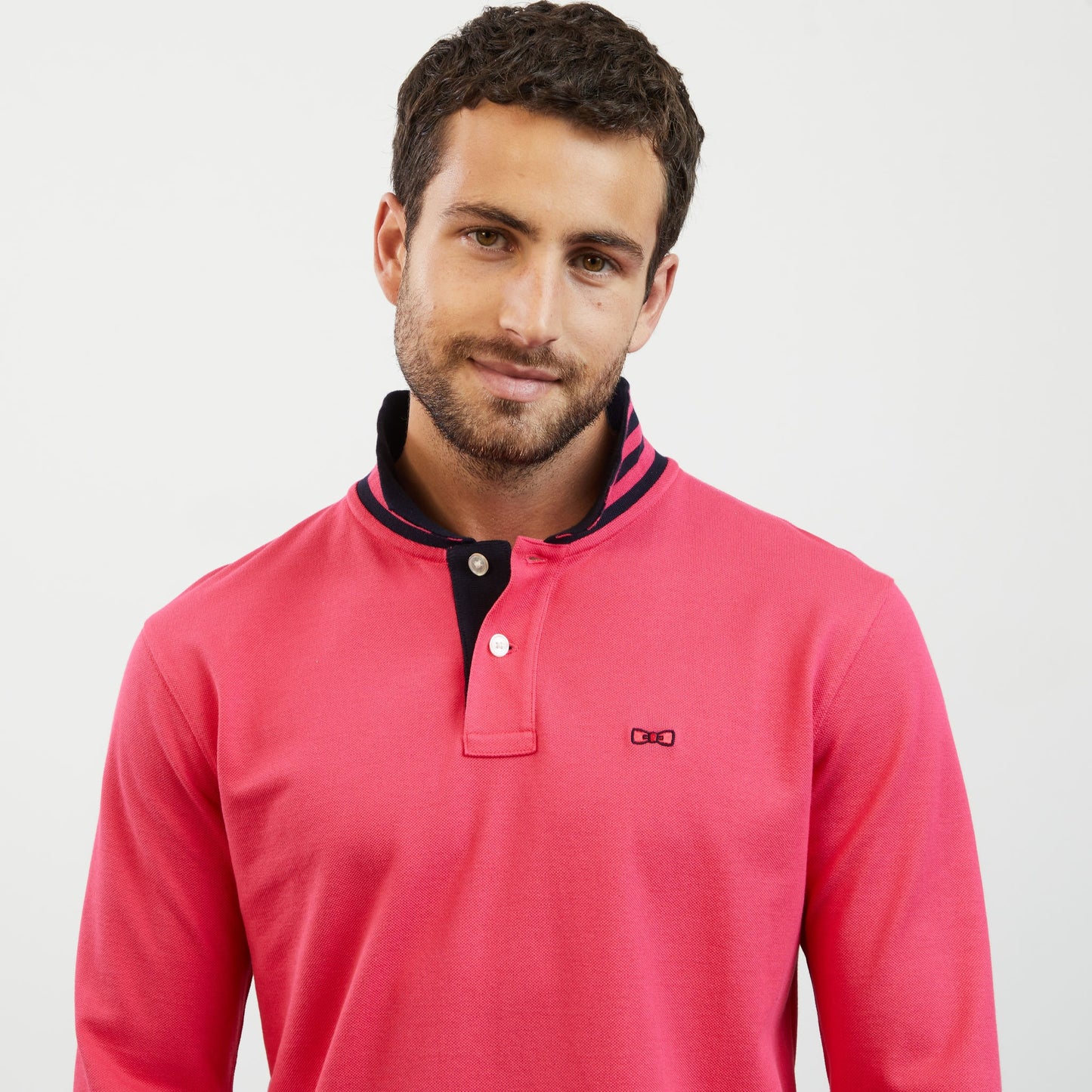 Pink long-sleeved polo shirt