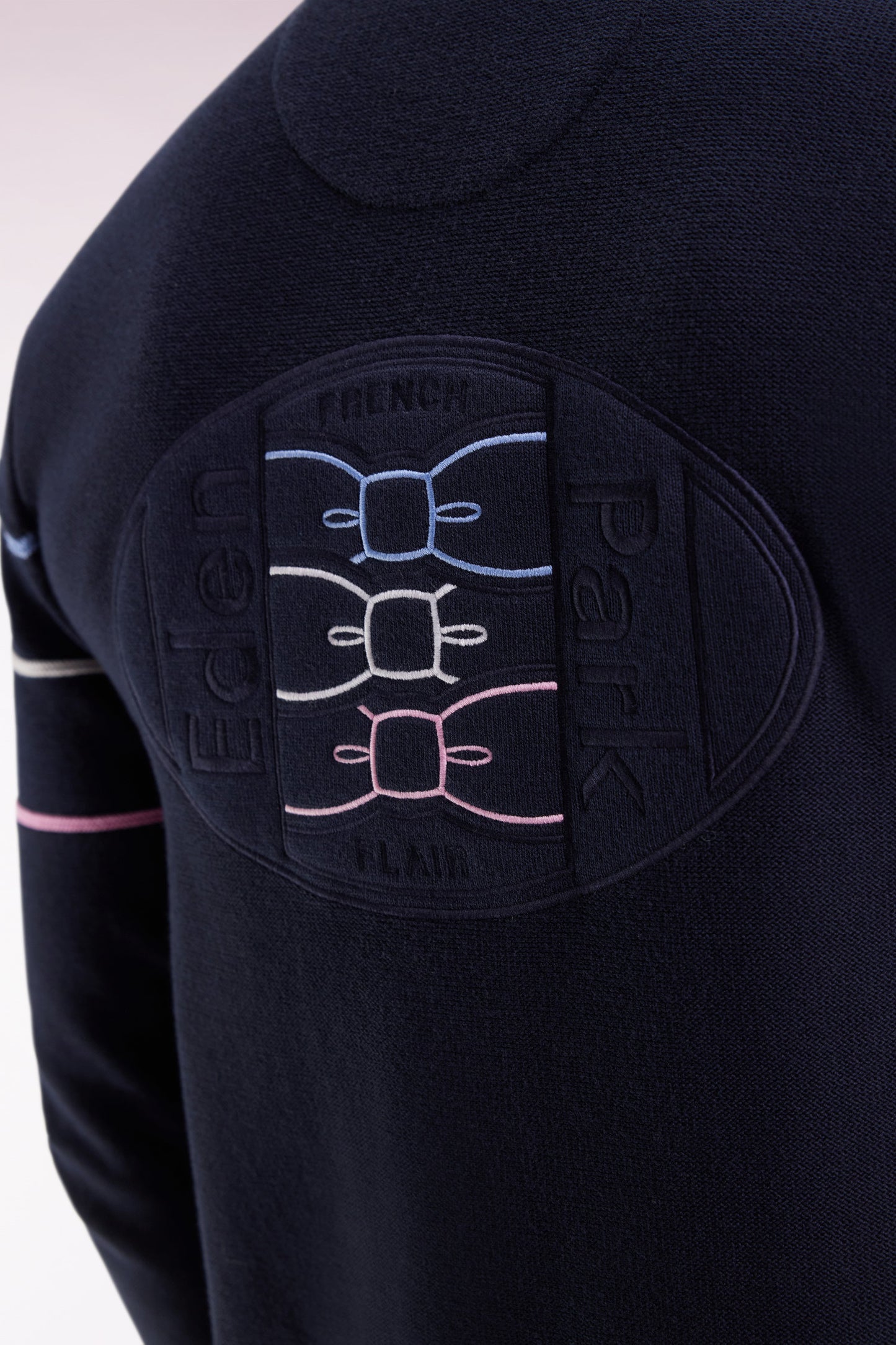 Navy cotton zipped cardigan with coloured piping, straight cut