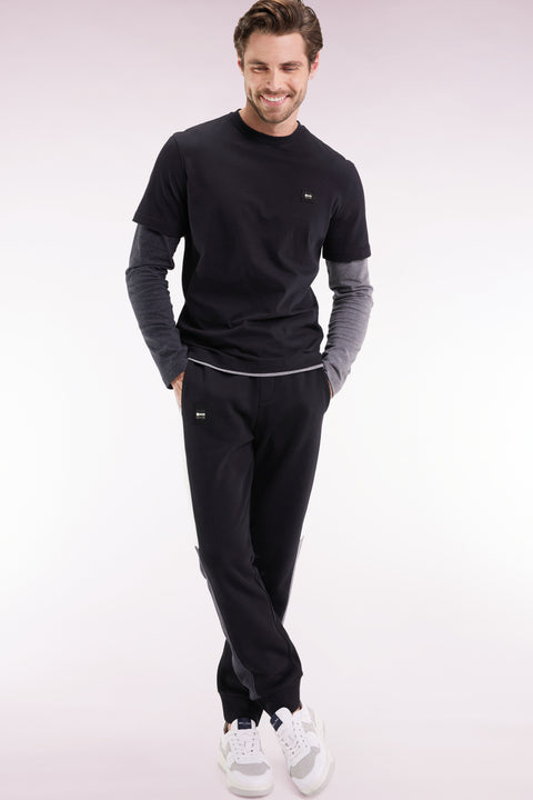 Jogging suit in black colorblock brushed fleece, straight cut - Image 1