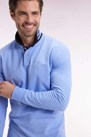 Long-sleeved polo shirt in sky cotton piqué with striped collar.