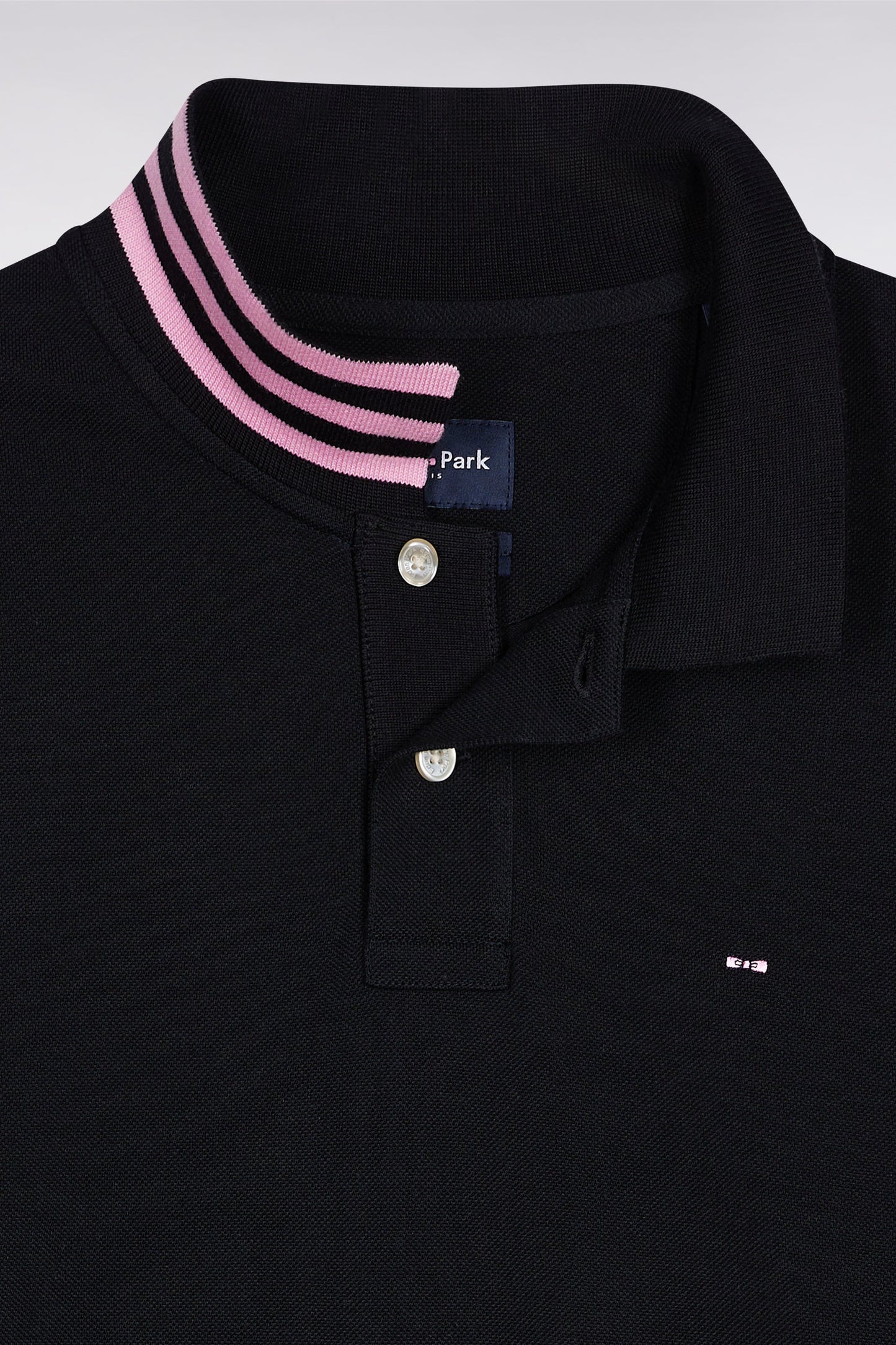 Long-sleeved polo shirt in black cotton piqué with striped collar.