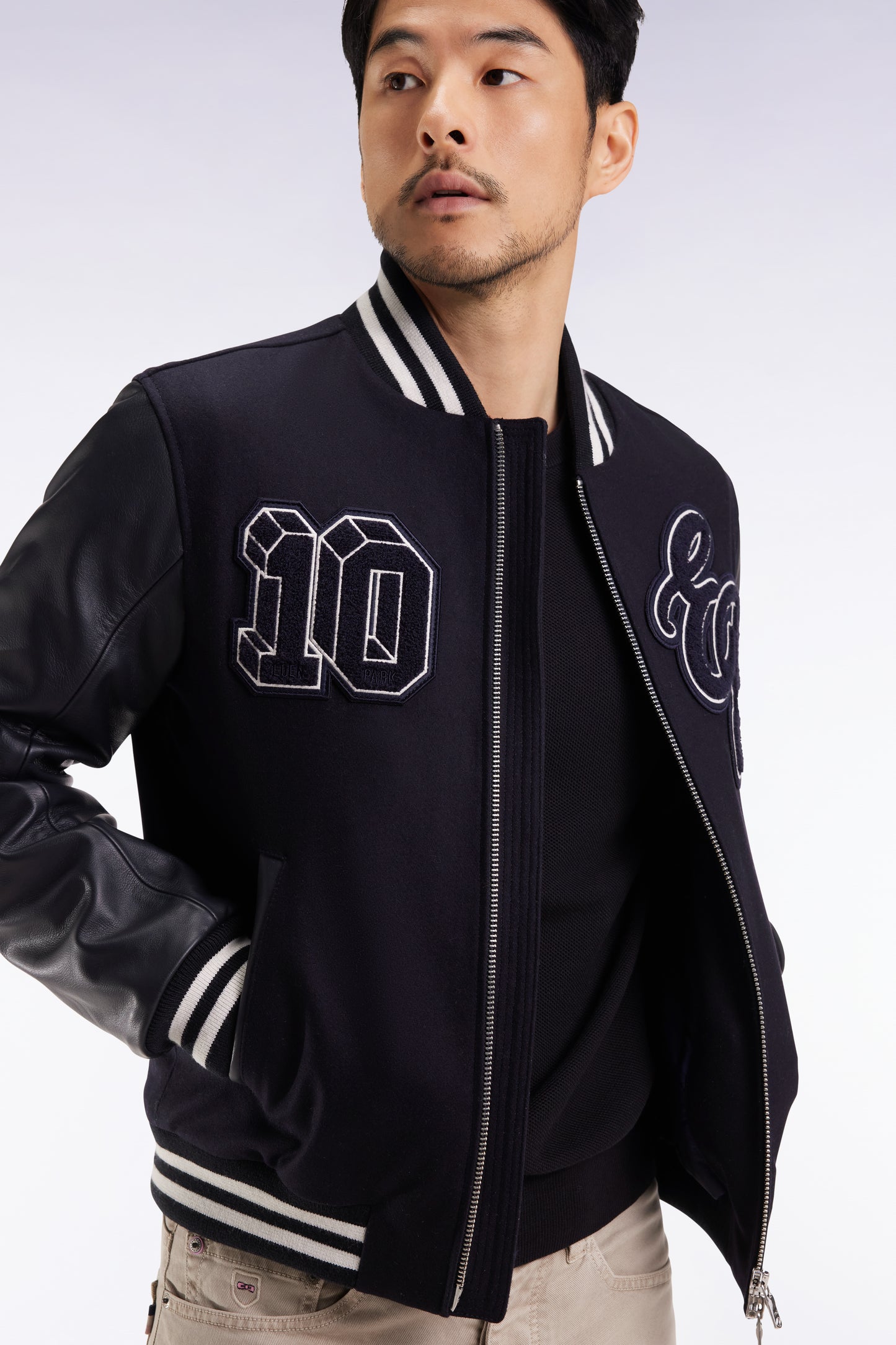 Two-tone teddy jacket with navy leather sleeves