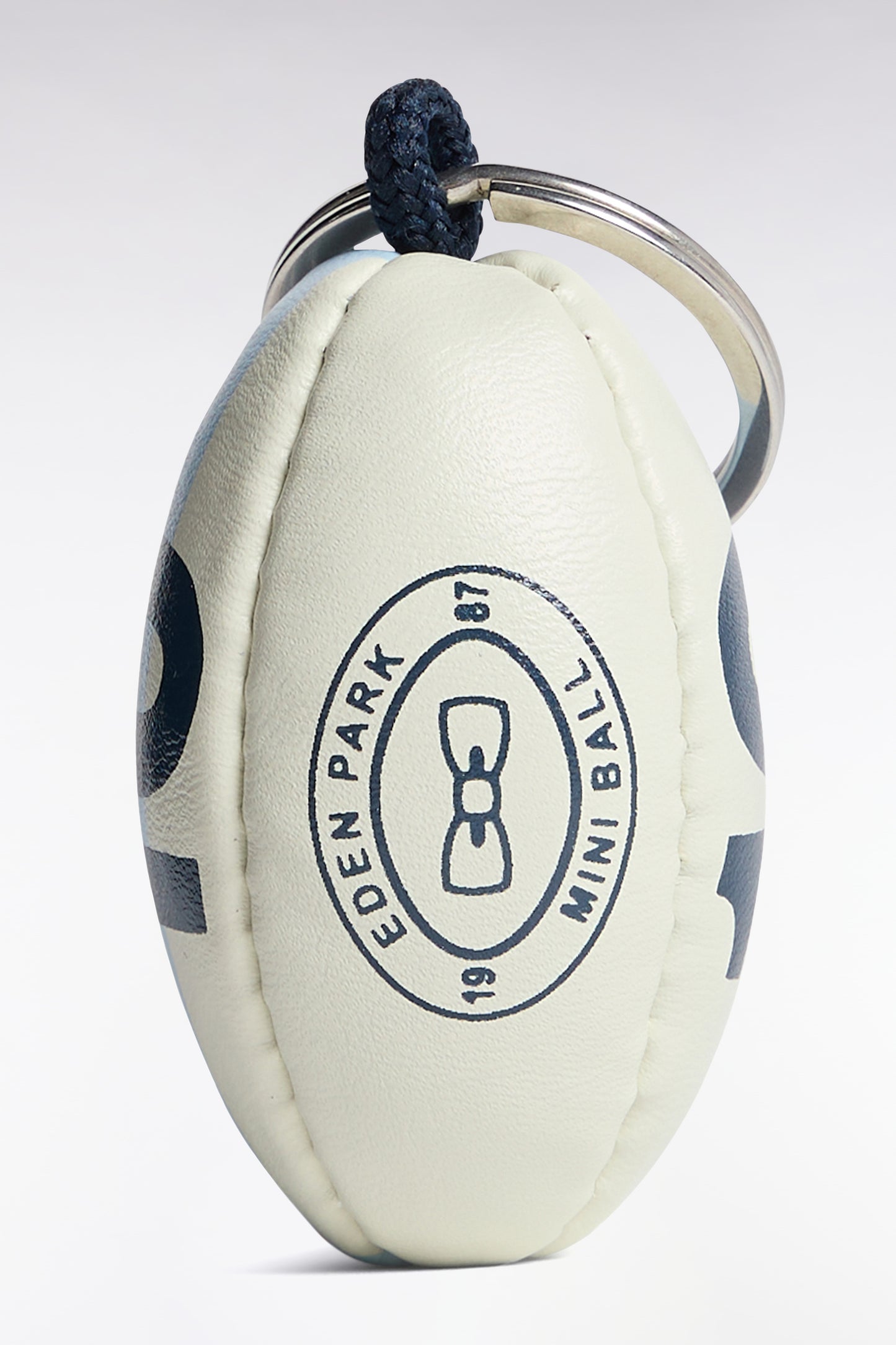 Porte-clés caoutchouc ballon de rugby numéro 10 ciel