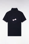 Short-sleeved polo shirt in white and navy cotton pique with embroidered back, straight cut