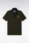 Short-sleeved green cotton polo shirt with straight cut patch