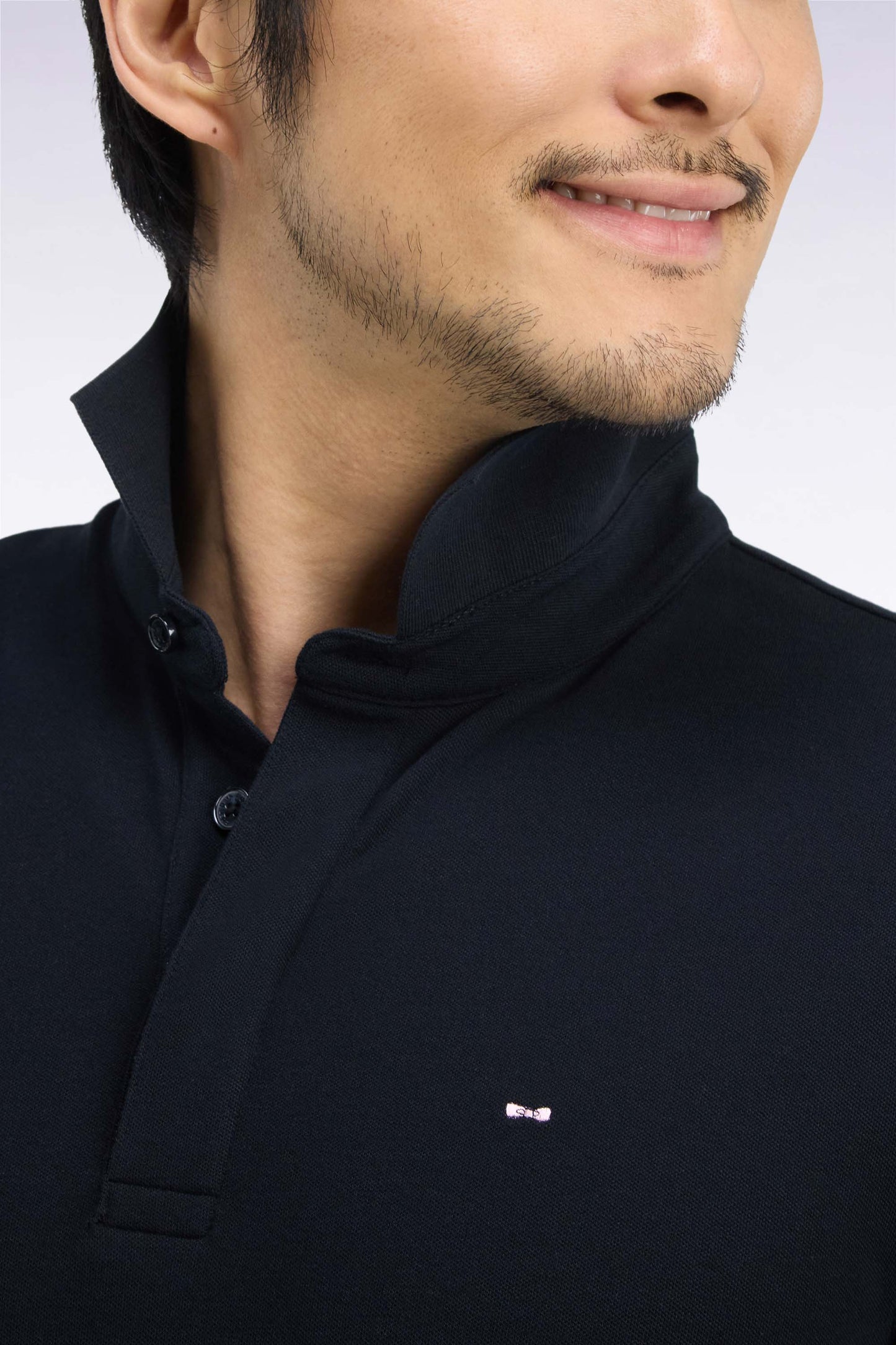 Polo manches longues en coton stretch noir coupe ajustée