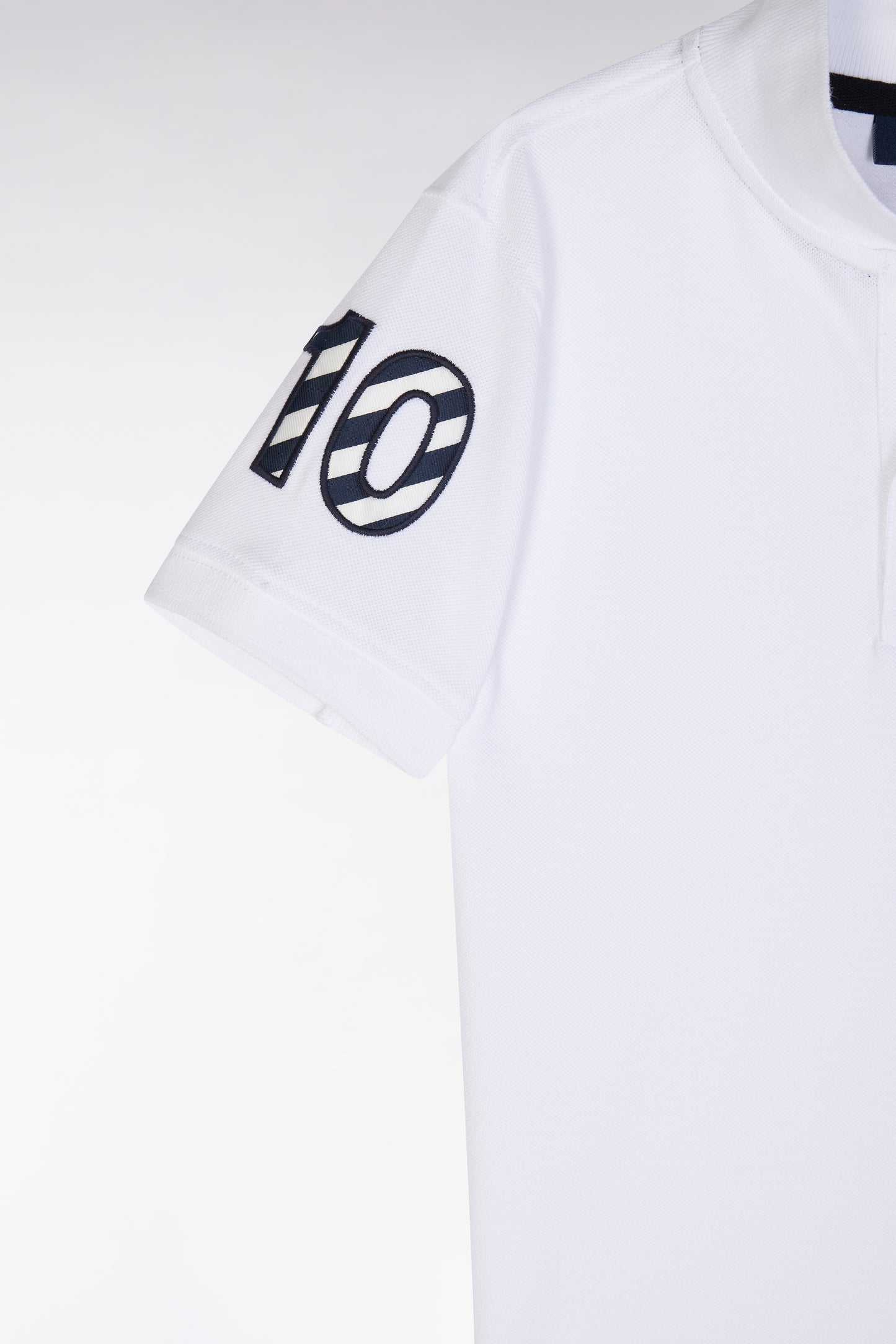 Straight-fit short-sleeved polo shirt in white cotton piqué with number 10 embroidery