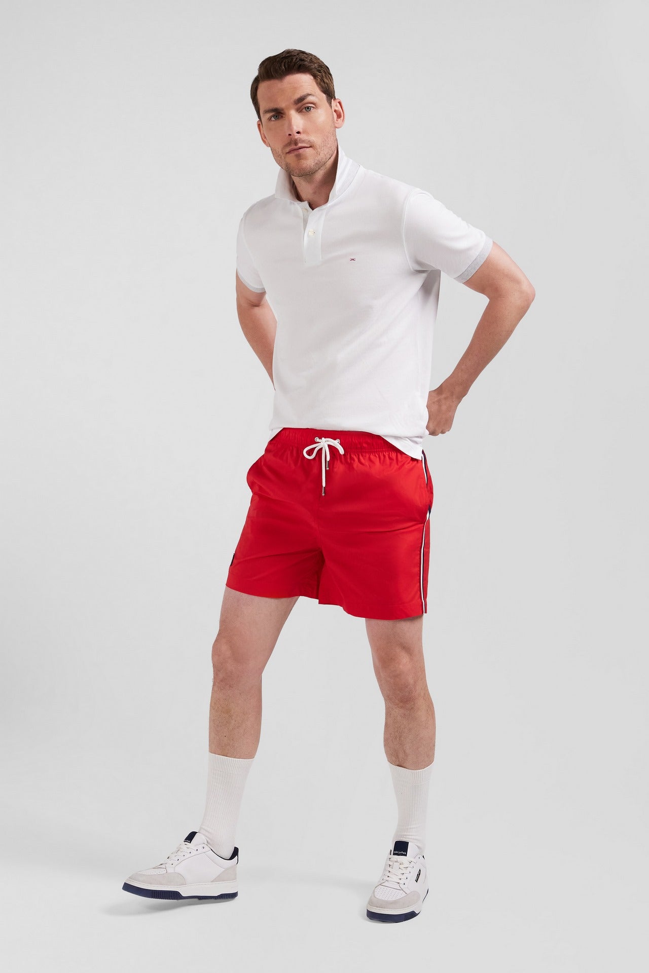 Swim shorts with tricoloured stripes