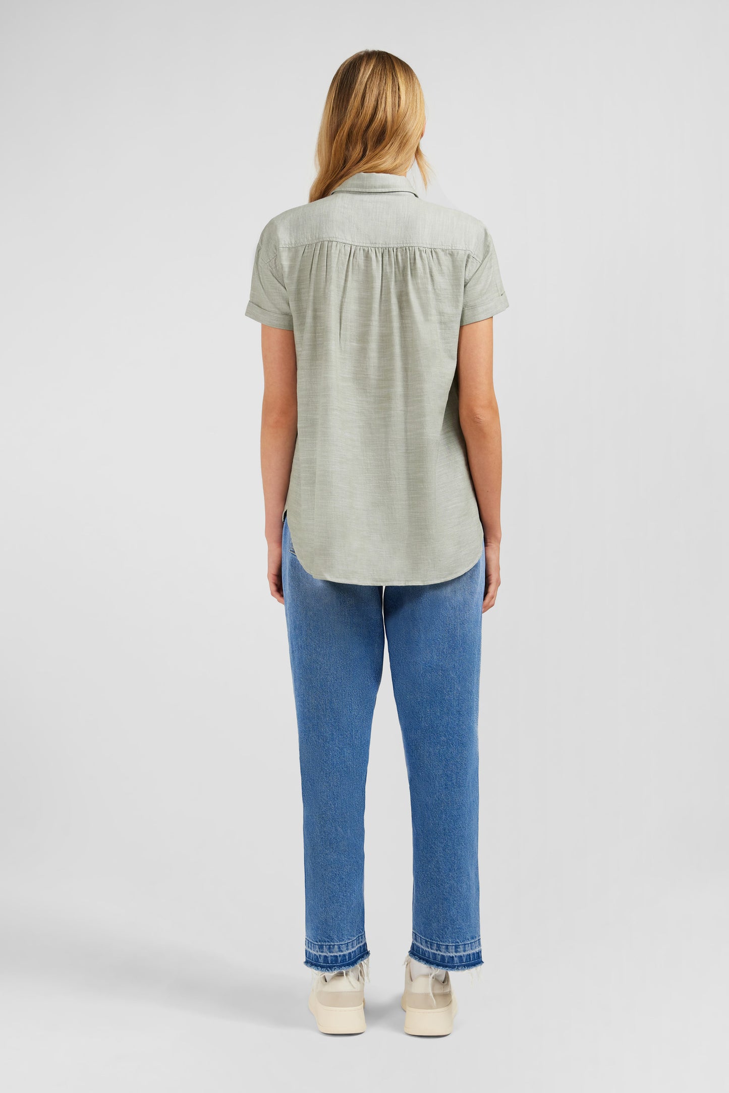 Green short-sleeved blouse