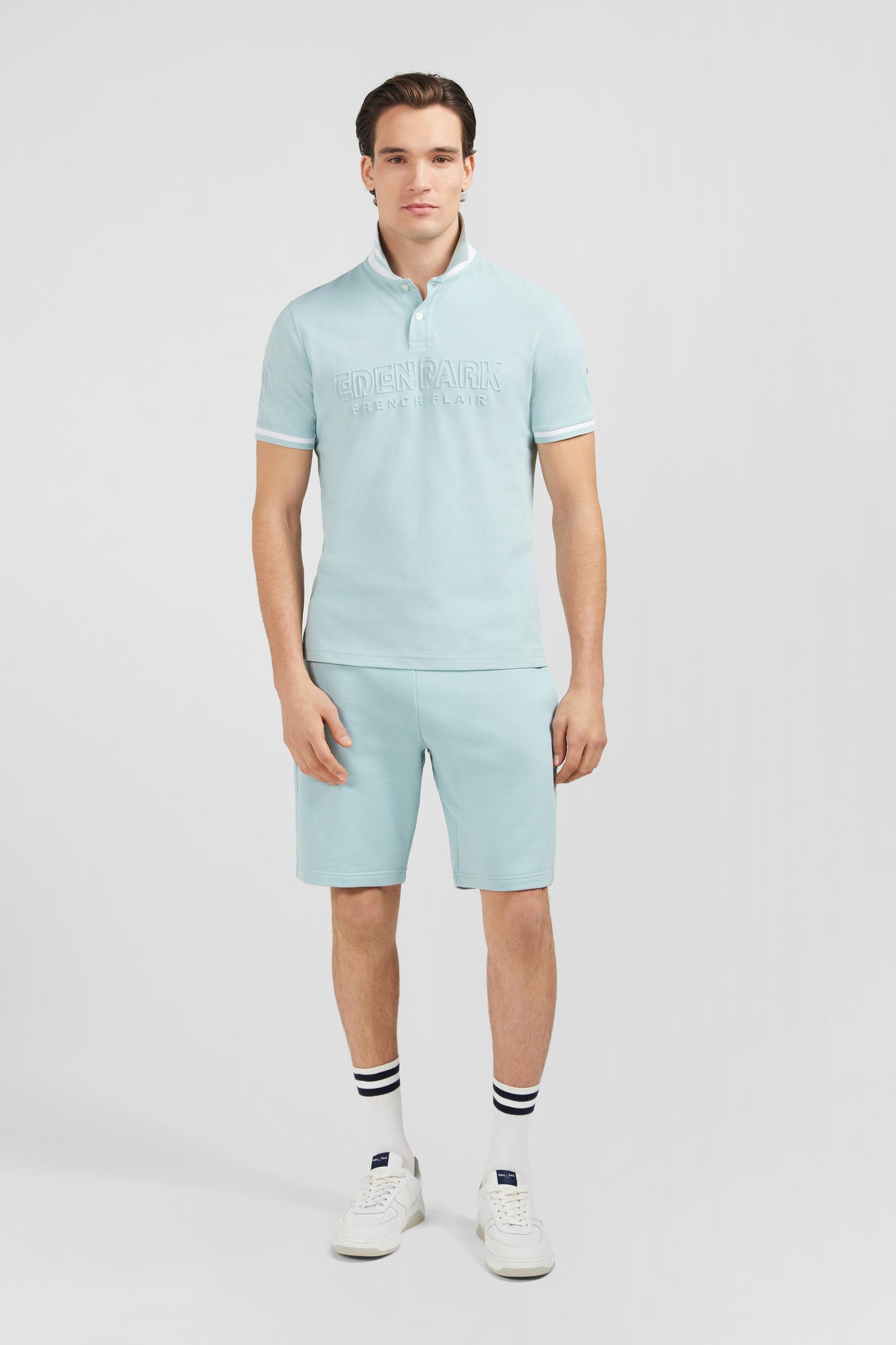 Plain green short-sleeved polo shirt