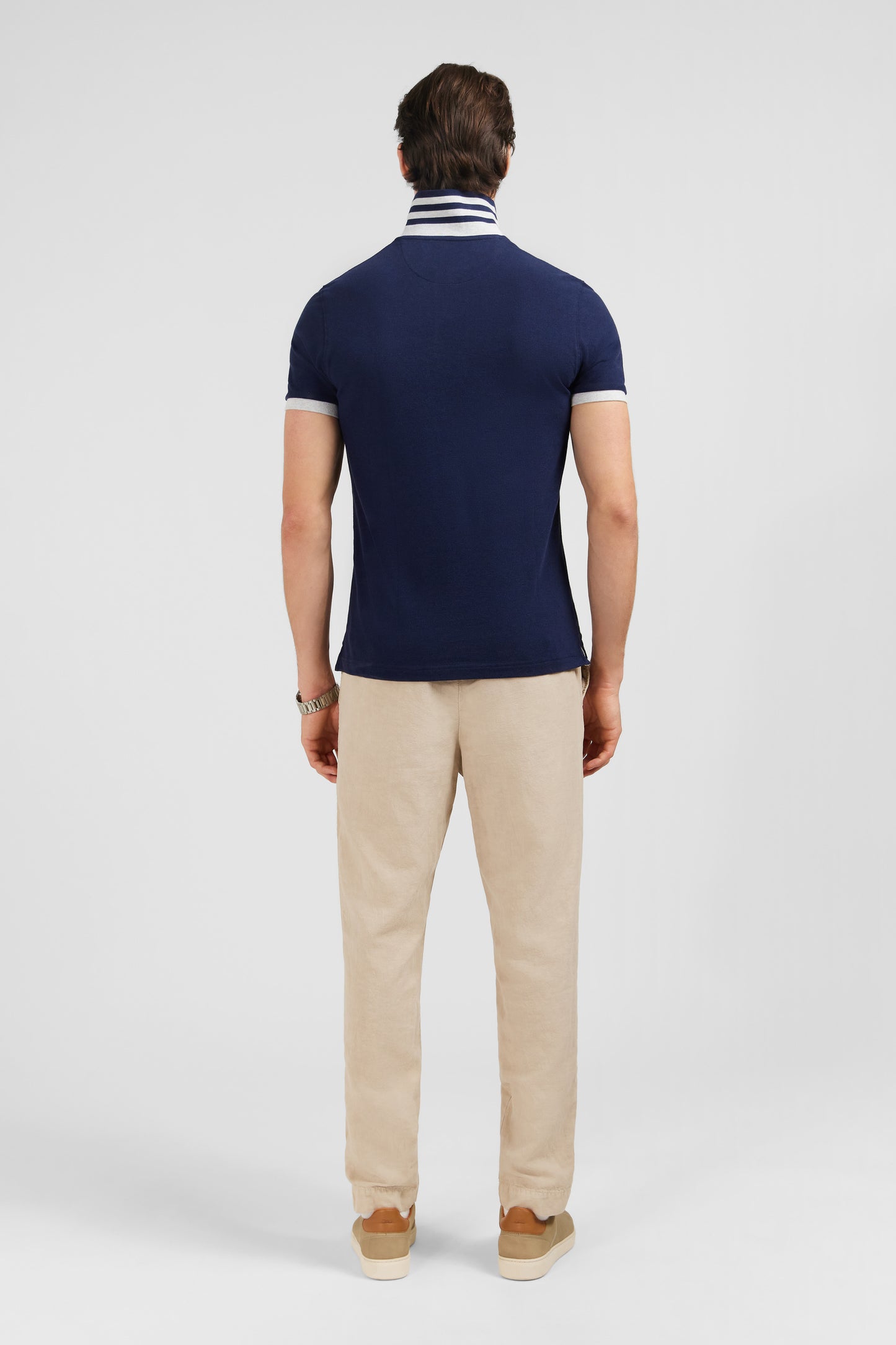 Navy blue short-sleeved polo shirt