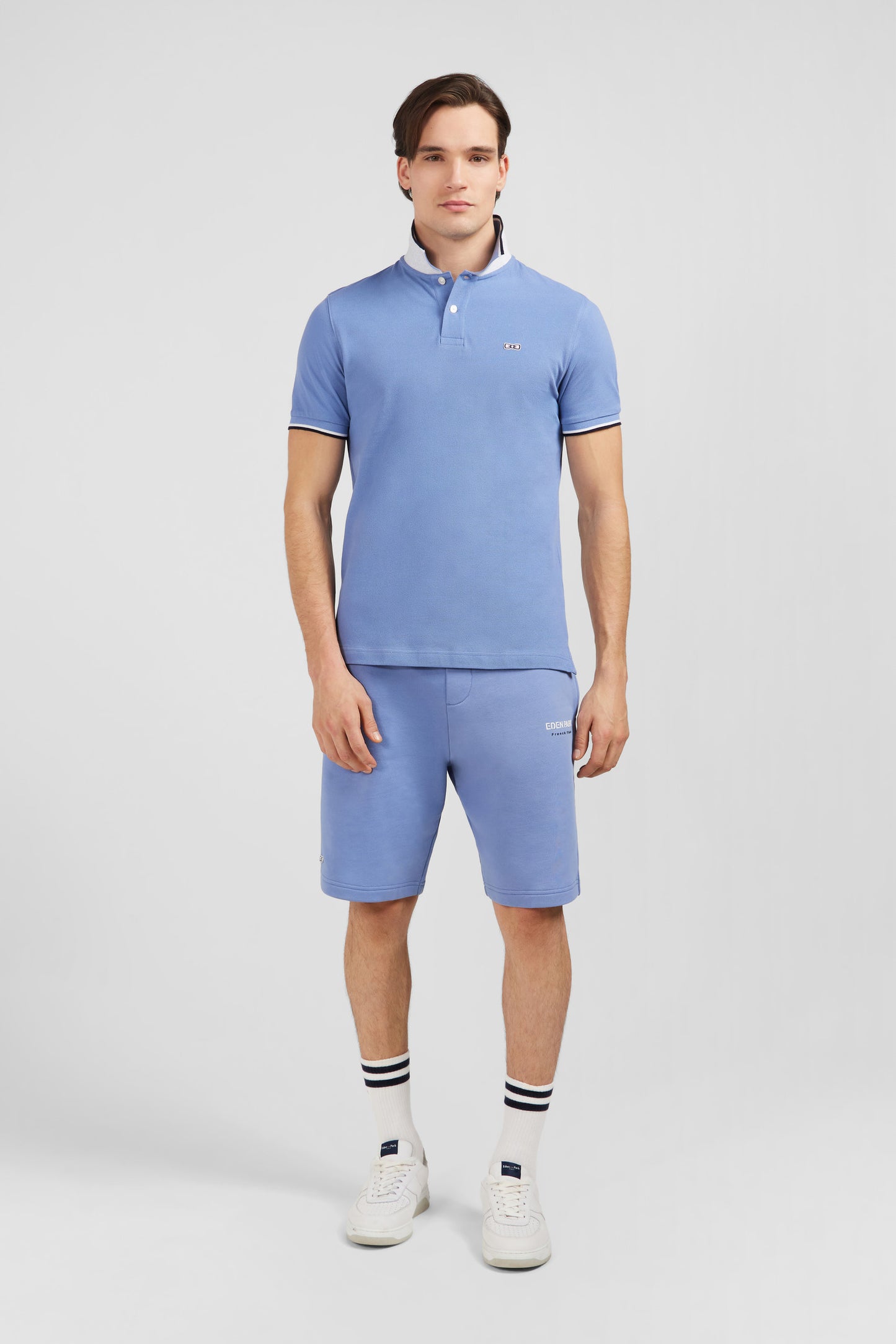 Plain light blue short-sleeved polo shirt
