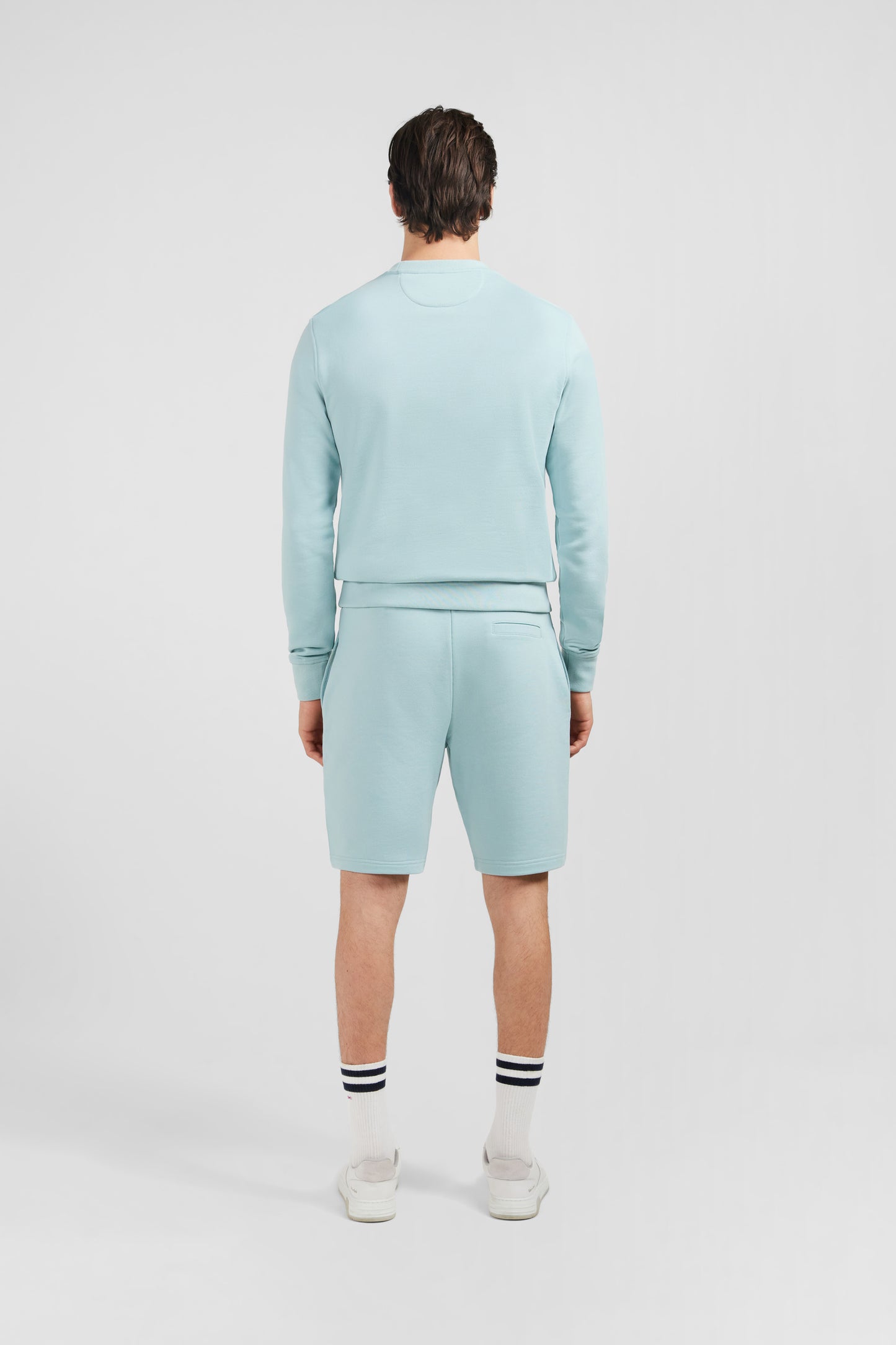 Green fleece round-neck sweatshirt with bow tie embroidery
