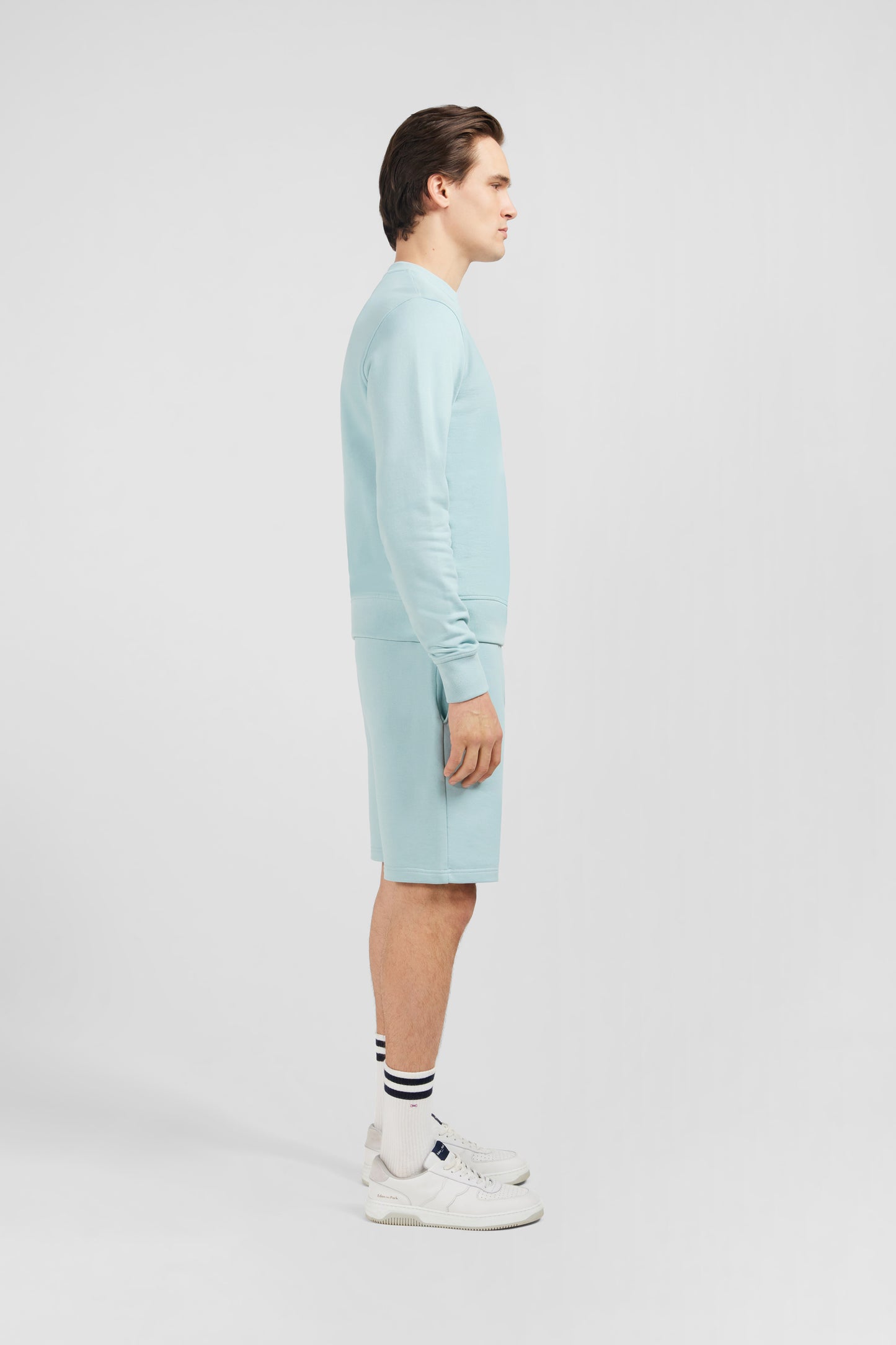 Green fleece round-neck sweatshirt with bow tie embroidery