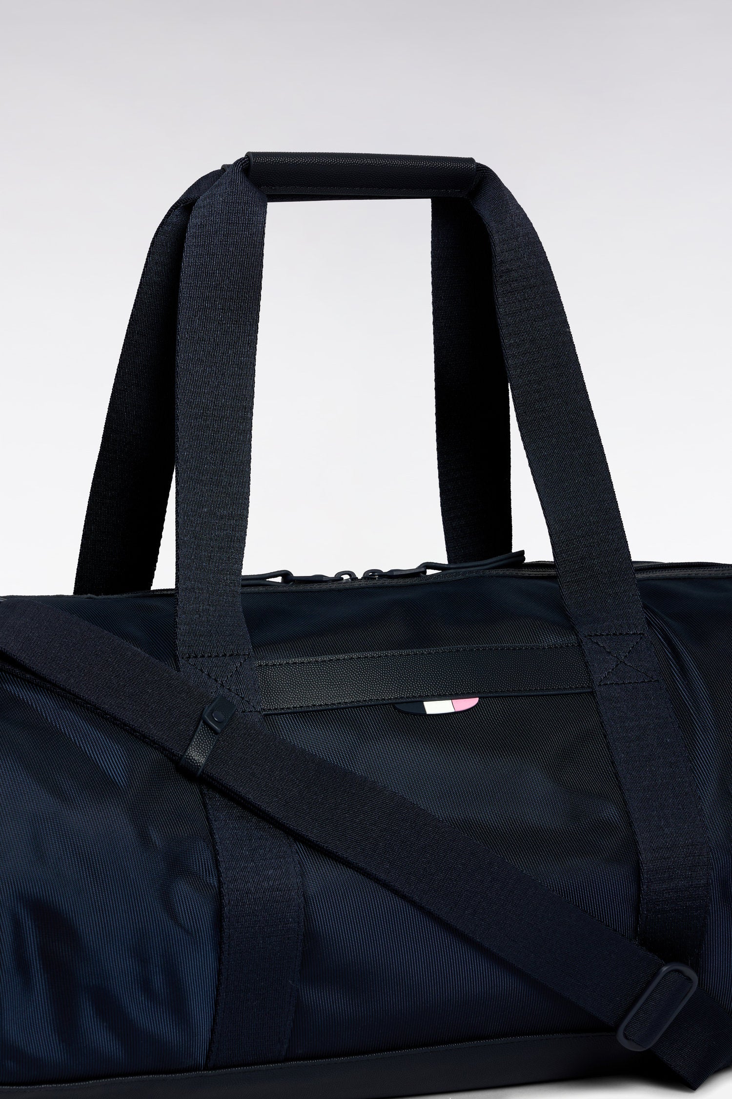 Sac de sport marine et noir en cuir et tissu