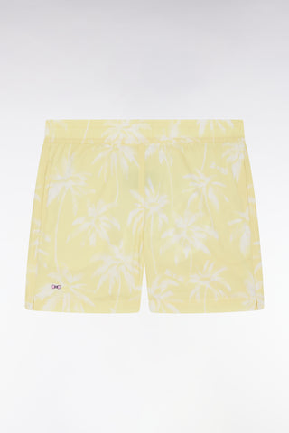 Yellow children's swimsuit with palm tree print