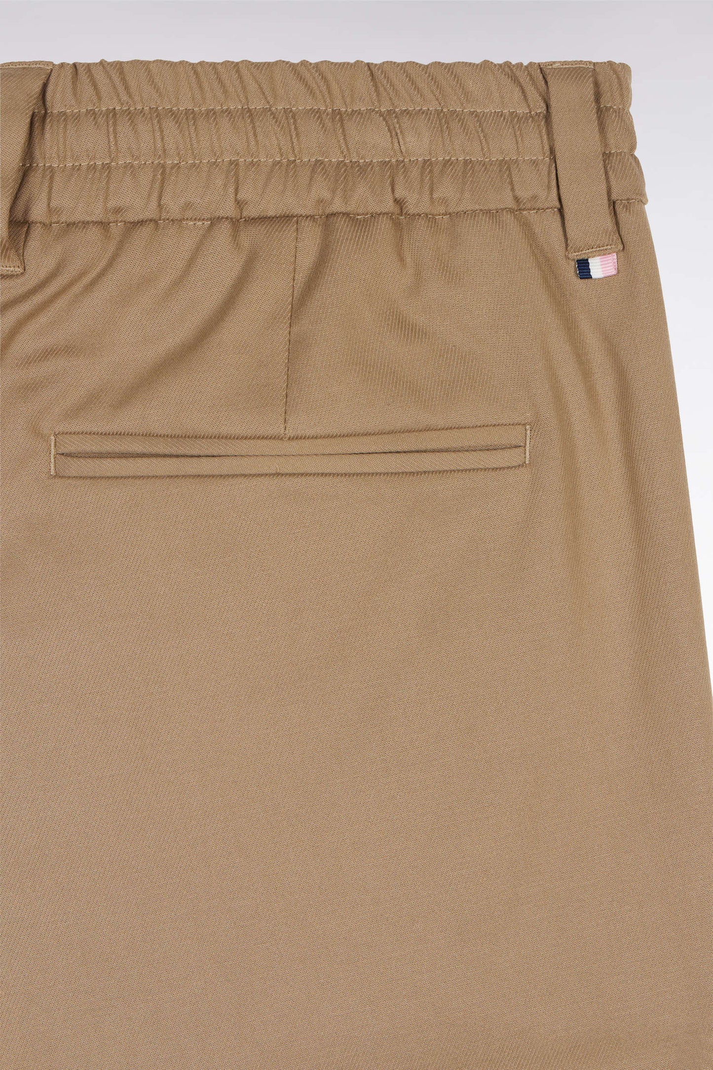 Elastic trousers in camel lyocell and stretch cotton