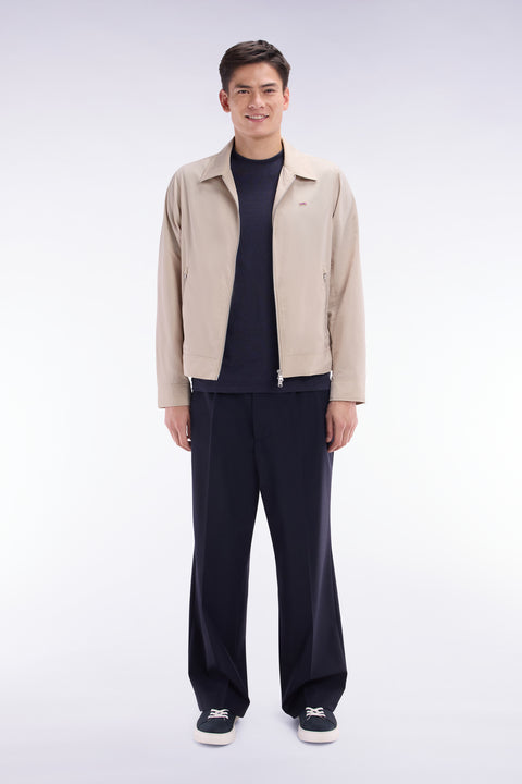 Wide-leg pleated trousers in navy stretch wool blend - Image 1