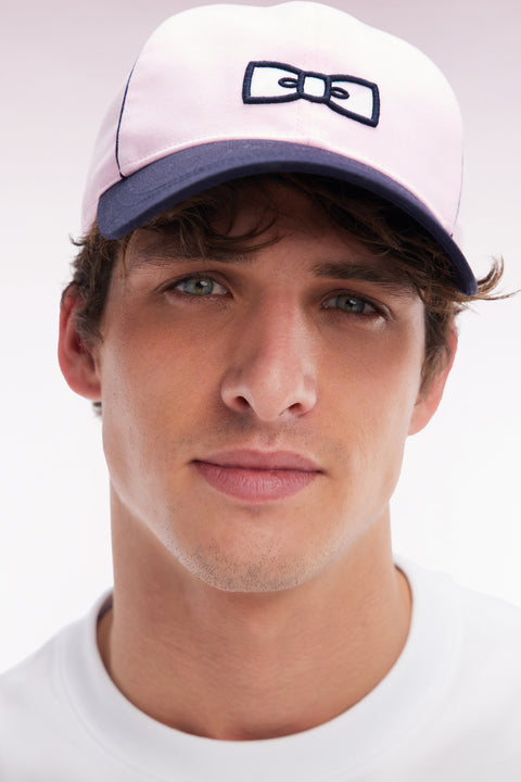 Pink cotton jersey cap with striped bow tie logo - Image 1