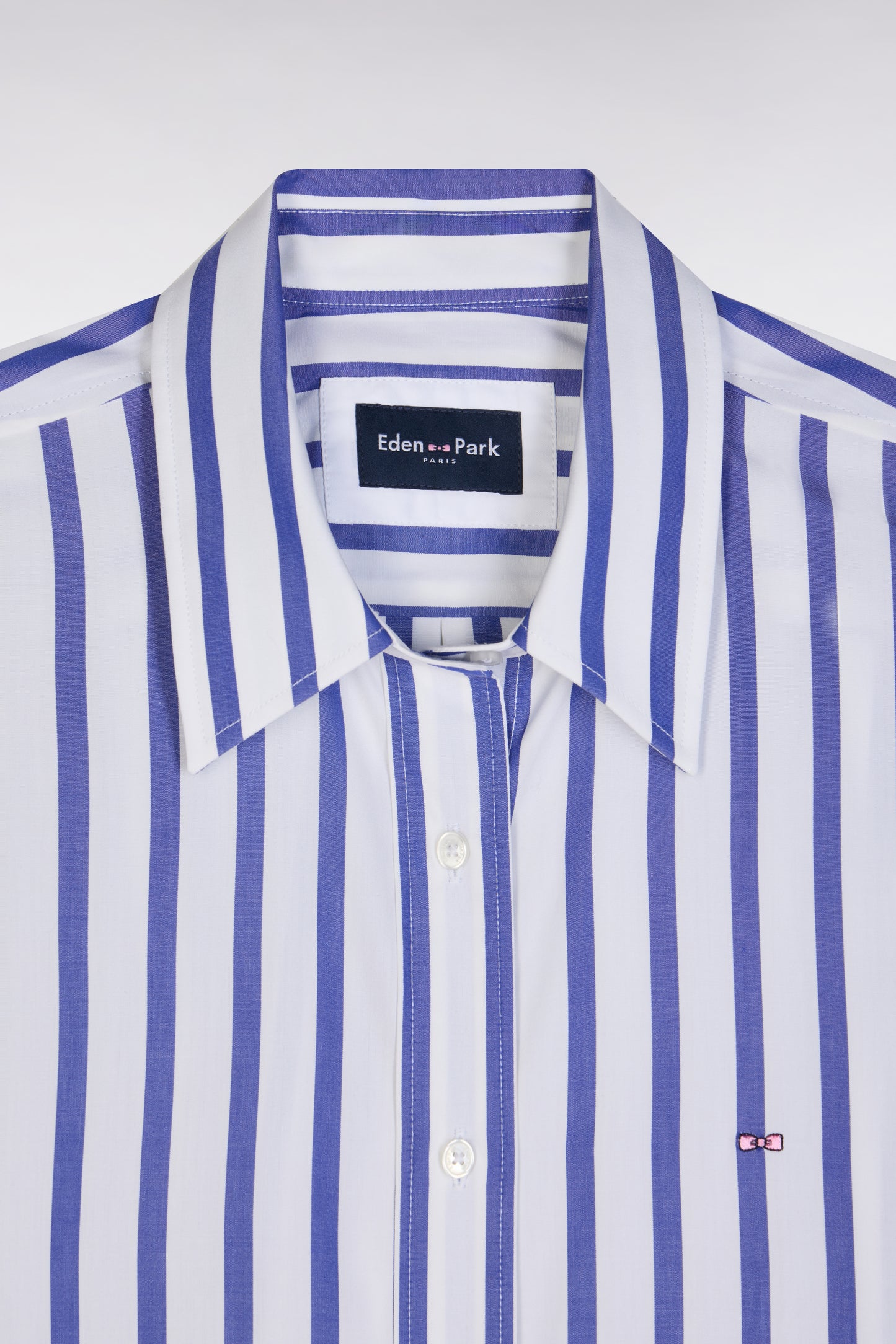 Oversized white cotton shirt with blue stripes