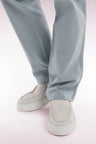 Loafers with sneakers soles in ecru suede leather
