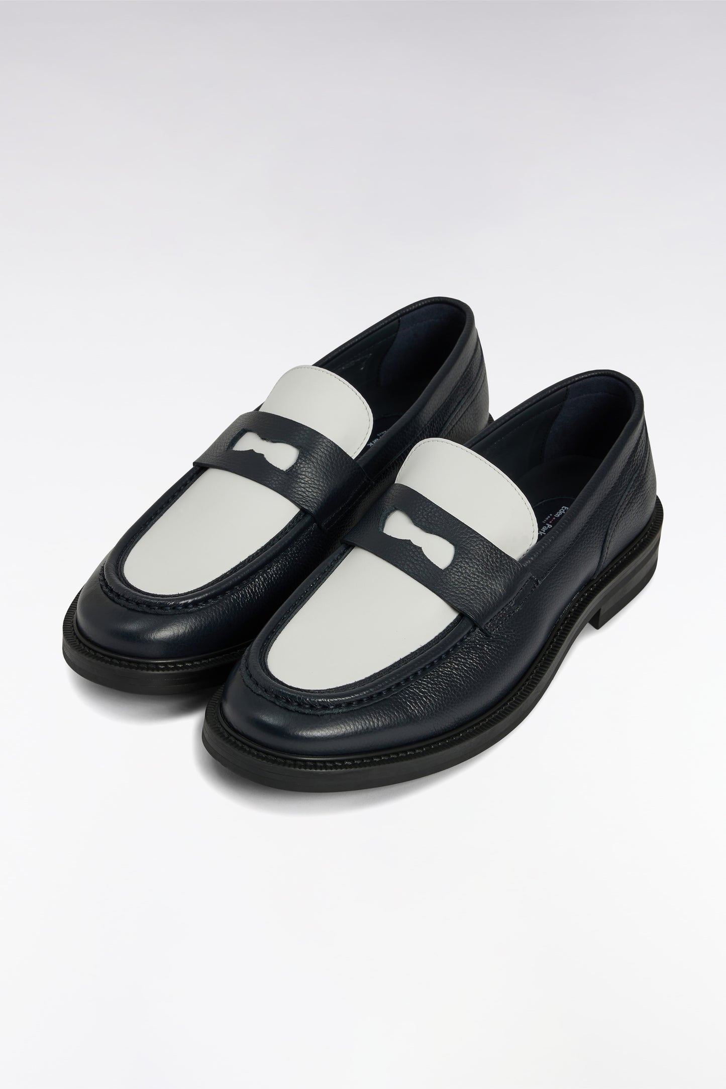 Two-tone moccasins in navy blue and white grained leather