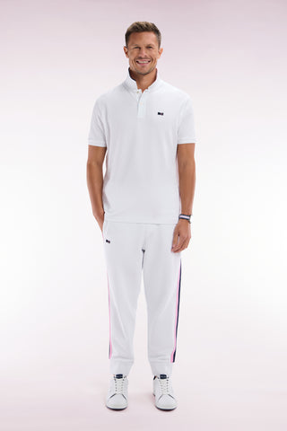 Relaxed-fit white cotton jogging pants with tricolor accents