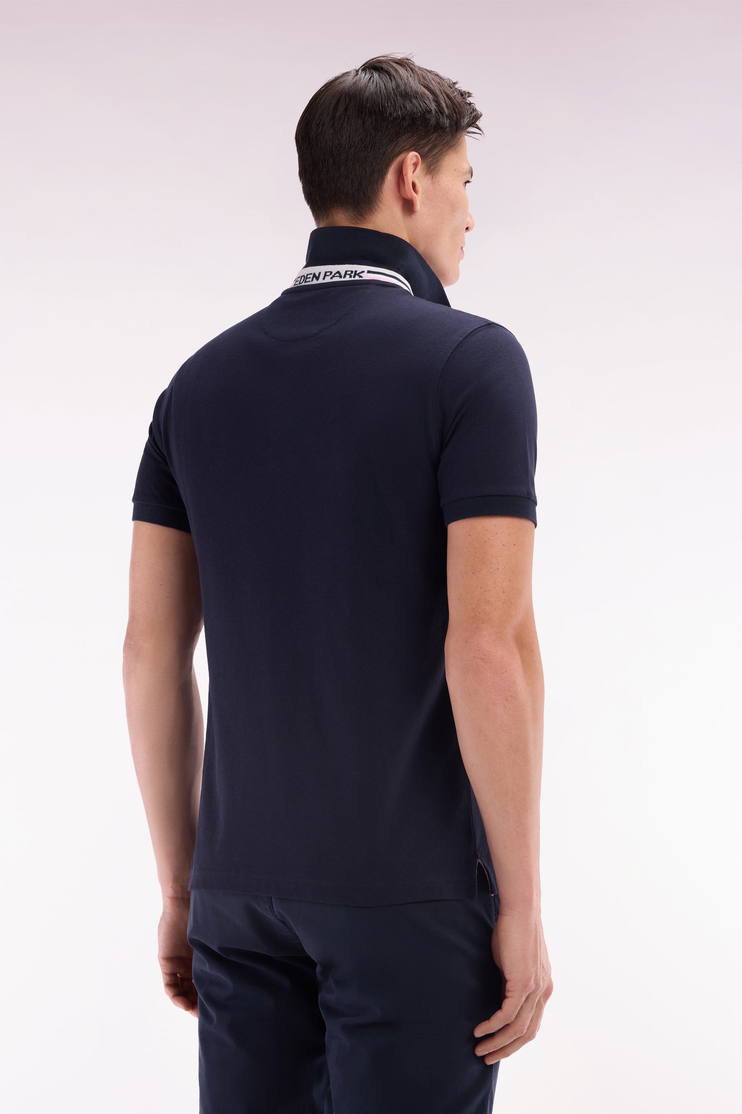 Straight-fit short-sleeved polo shirt in navy cotton piqué with tricolor embroidery