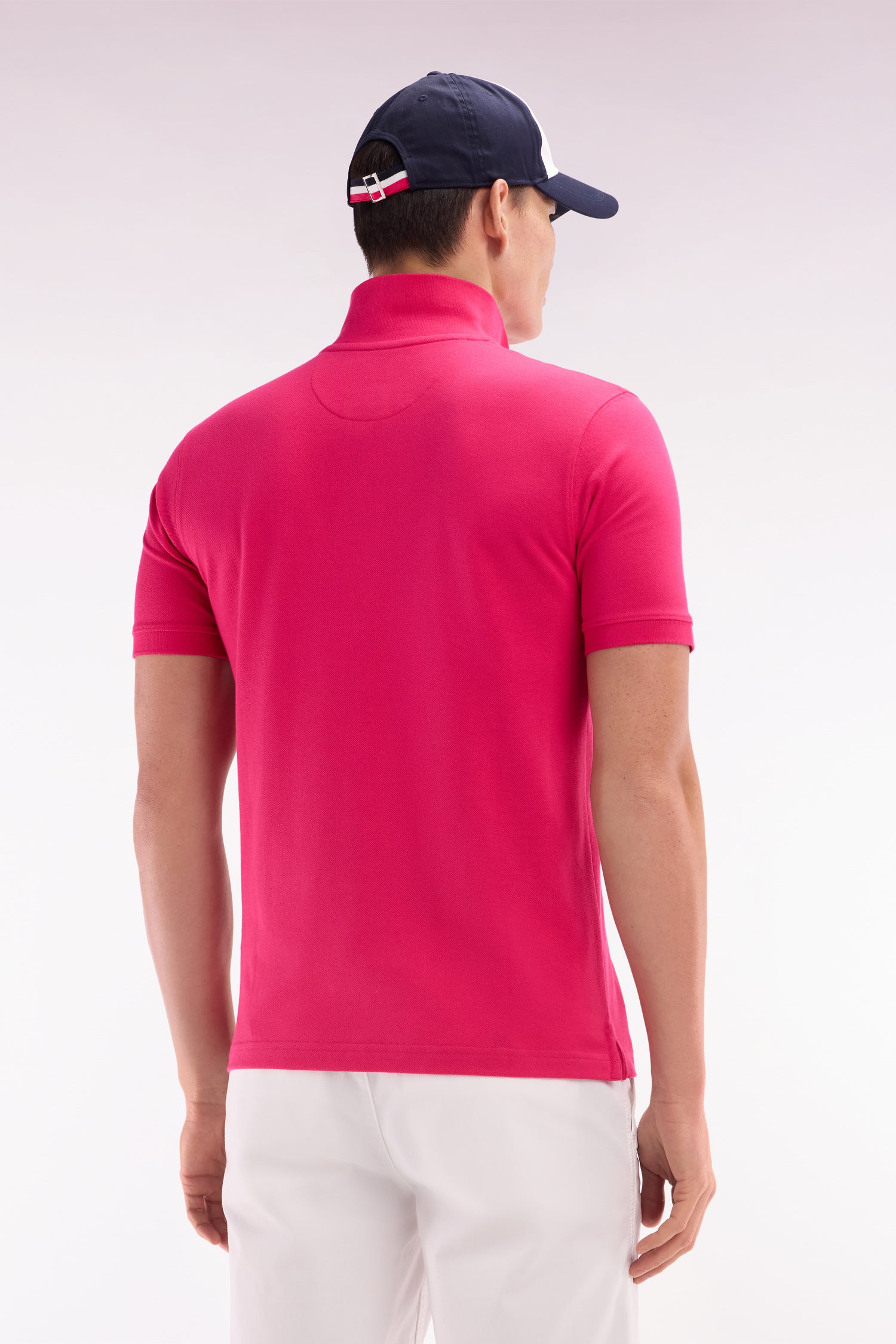 Polo à manches courtes uni en coton Pima fuchsia coupe droite