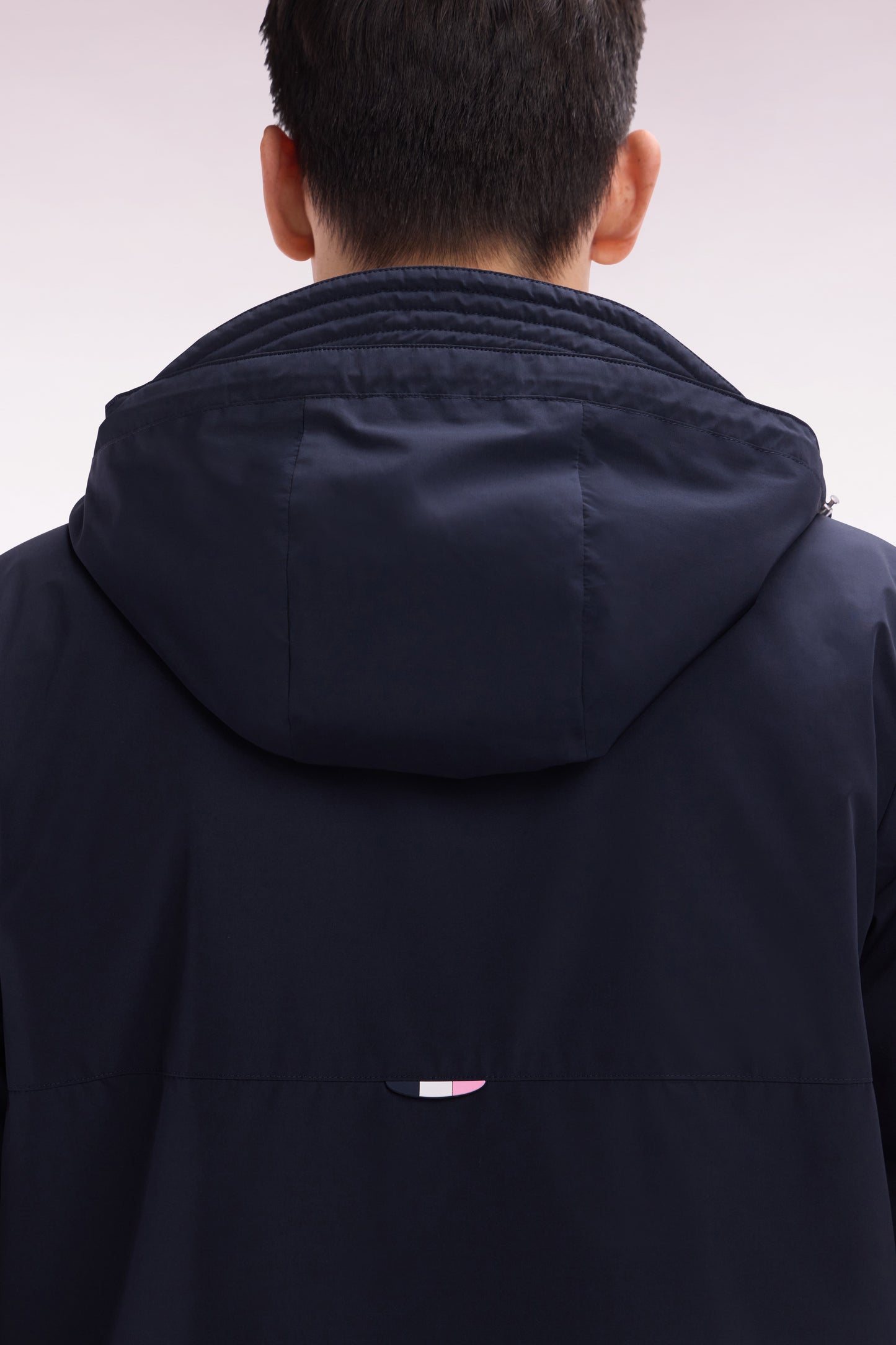 Polyamide hooded windbreaker with navy quilted interior