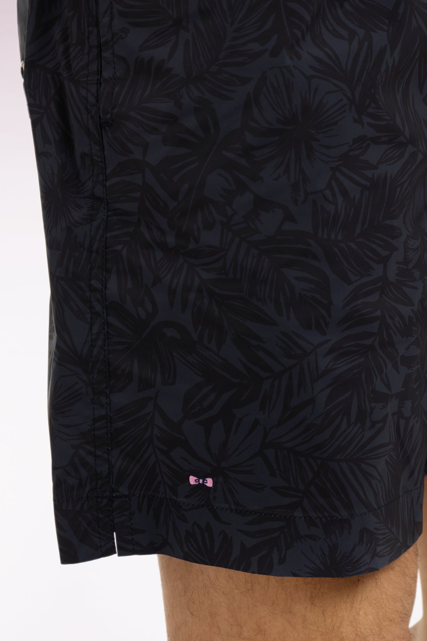 Navy swimsuit with tropical print