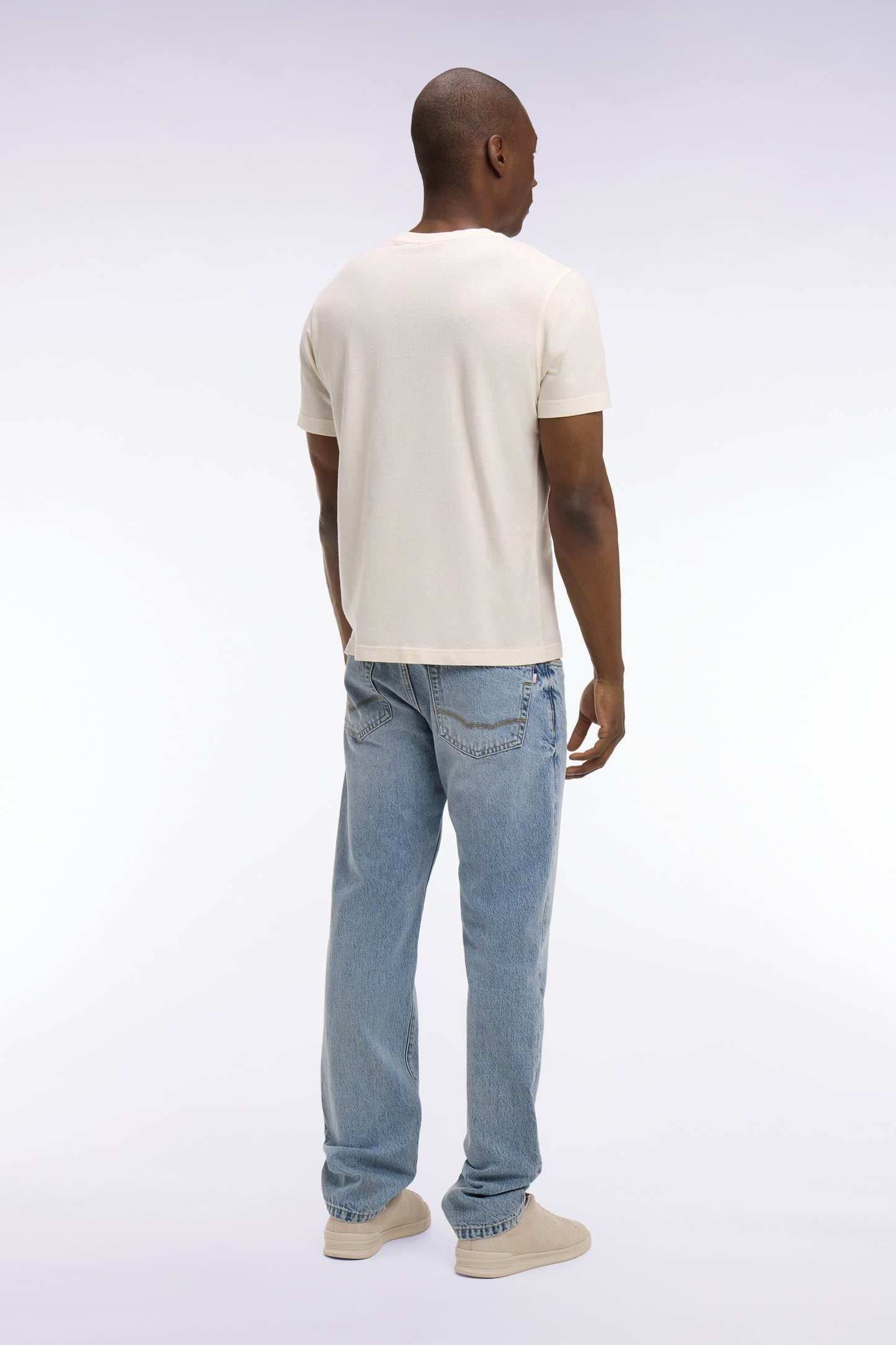 Jean en denim stretch bleu foncé stone bleach coupe regular