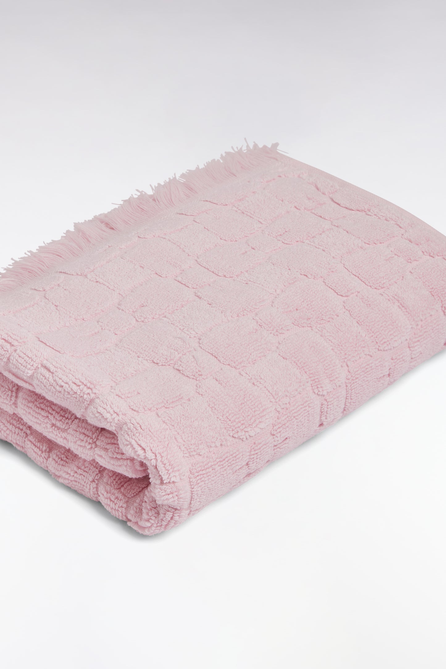 Pink cotton hand towel with micro bowknot patterns