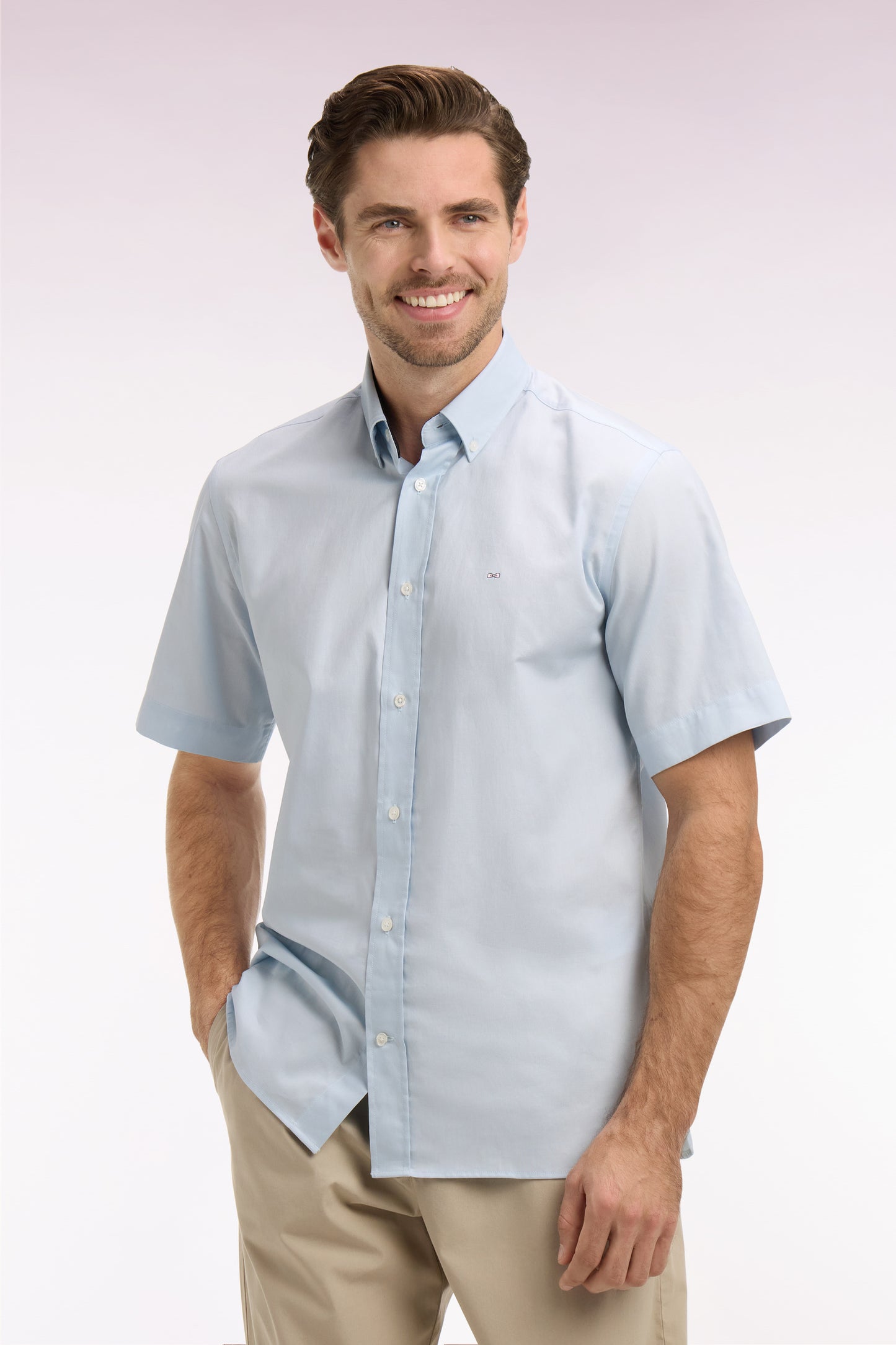 Short-sleeved shirt in sky blue cotton with back embroidery