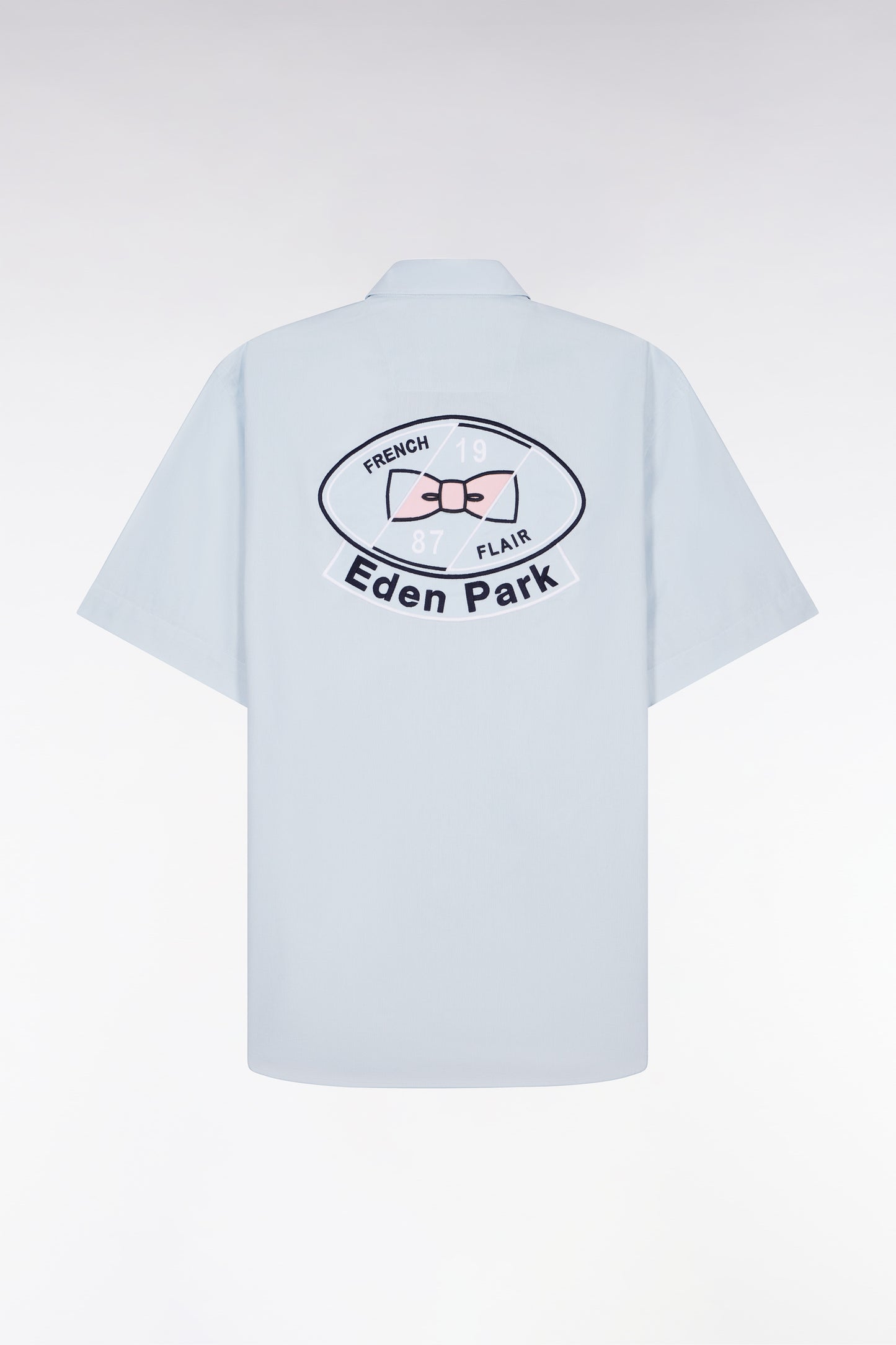 Short-sleeved shirt in sky blue cotton with back embroidery