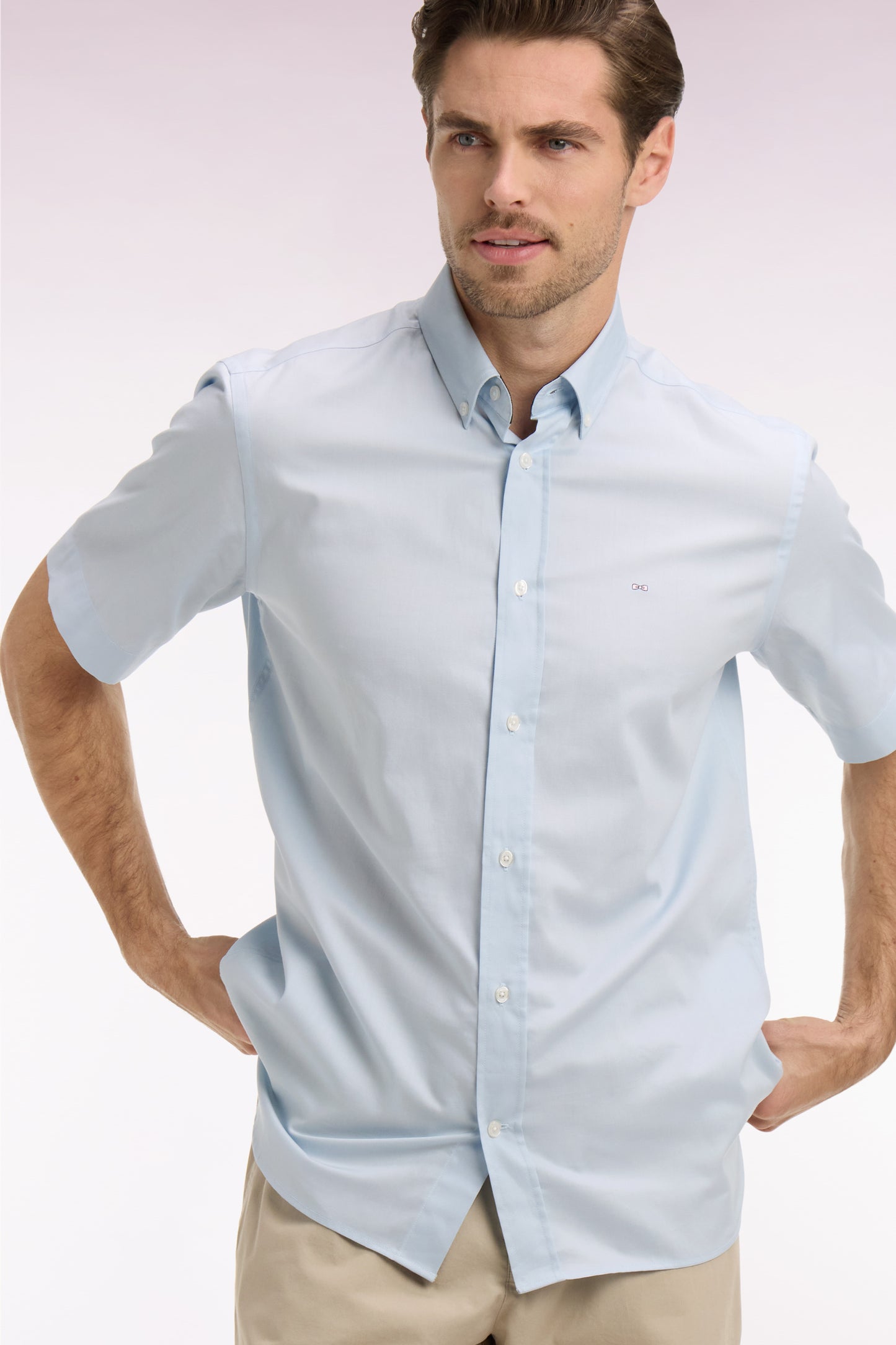 Short-sleeved shirt in sky blue cotton with back embroidery