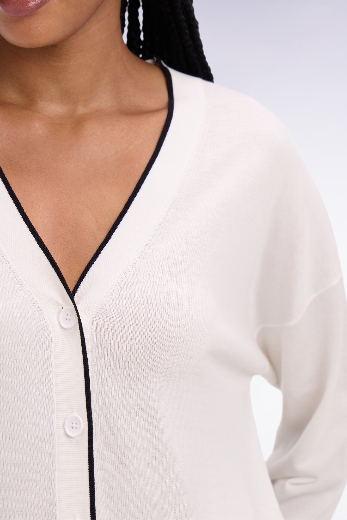 White V-neck buttoned cardigan